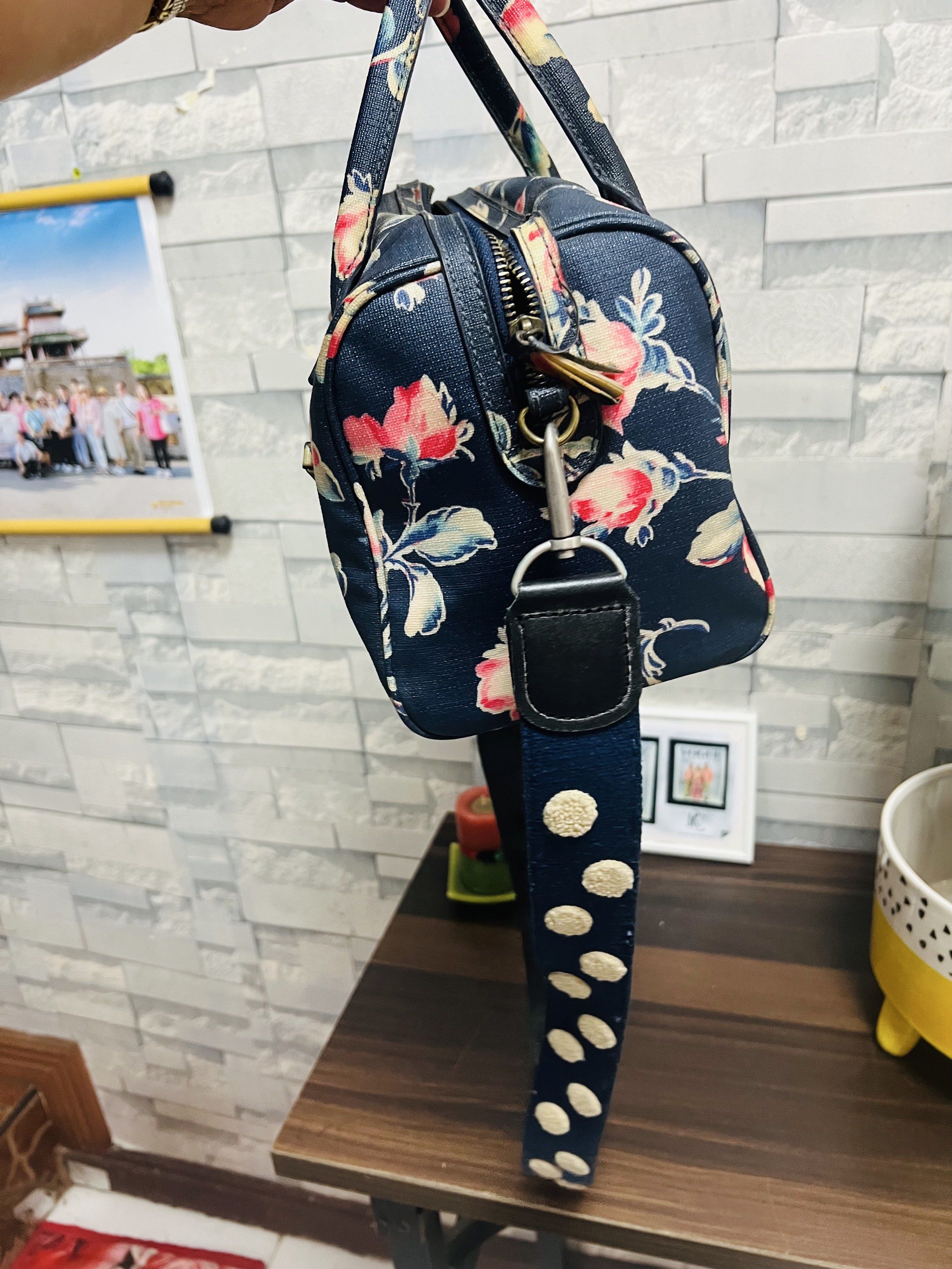 Cath Kidston Floral Handbag with Polka Dot Strap (Category: Tote Bags) located in Antipolo. Submitted by murapod2 (Listing ID 1418976757, Image 3). Description: - Cath Kidston handbag - Floral pattern on navy blue background - Top handle and detachable polka dot strap - Front zipper pocket - Main compartment with zipper closure - Interior with Cath Kidston label.