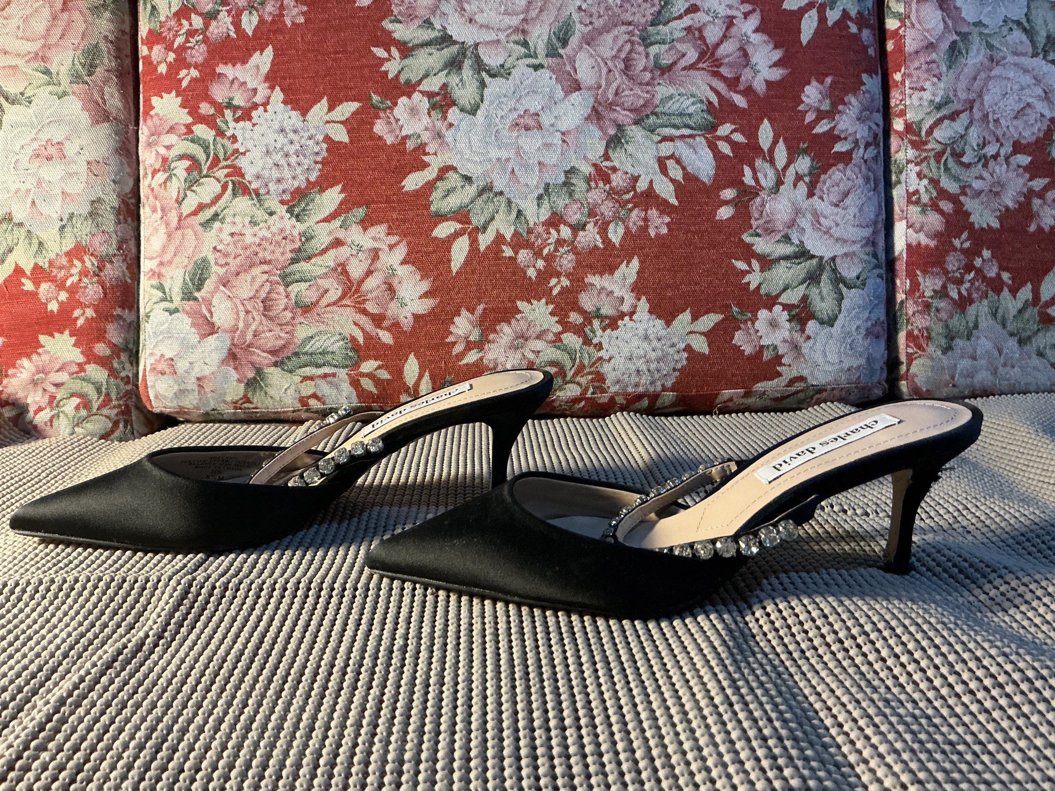 Charles David Black Kitten Heels with Rhinestones (Category: Heels) located in Taguig. Submitted by ben_is_here (Listing ID 1418914838, Image 2). Description: - Charles David black kitten heels - Satin texture - Rhinestone embellished straps - Stiletto heel - Size: US 6.5 - Almost new condition pero medyo sira na yung fabric ng left heel (see last photo).
