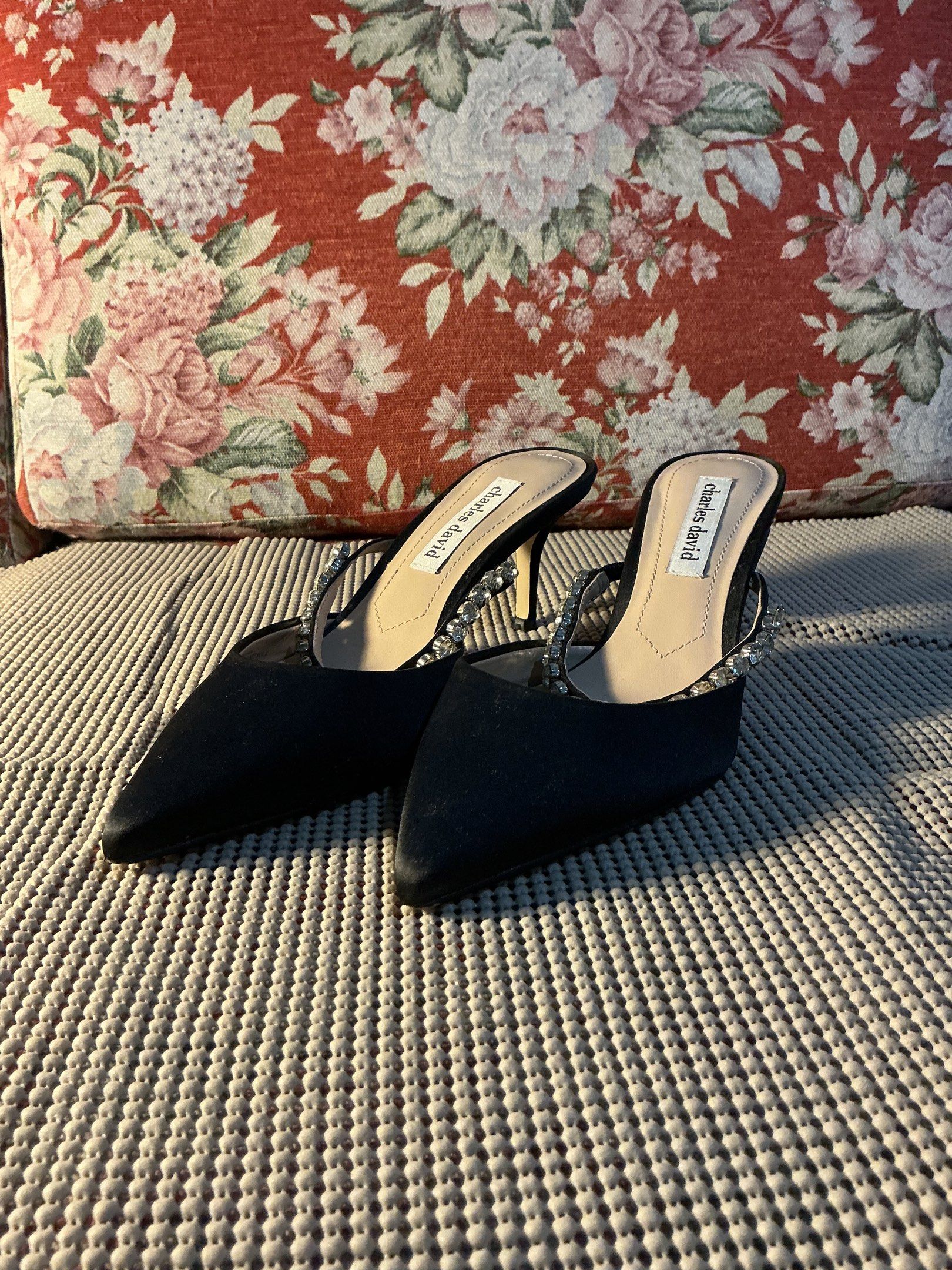 Charles David Black Kitten Heels with Rhinestones (Category: Heels) located in Taguig. Submitted by ben_is_here (Listing ID 1418914838, Image 1). Description: - Charles David black kitten heels - Satin texture - Rhinestone embellished straps - Stiletto heel - Size: US 6.5 - Almost new condition pero medyo sira na yung fabric ng left heel (see last photo).
