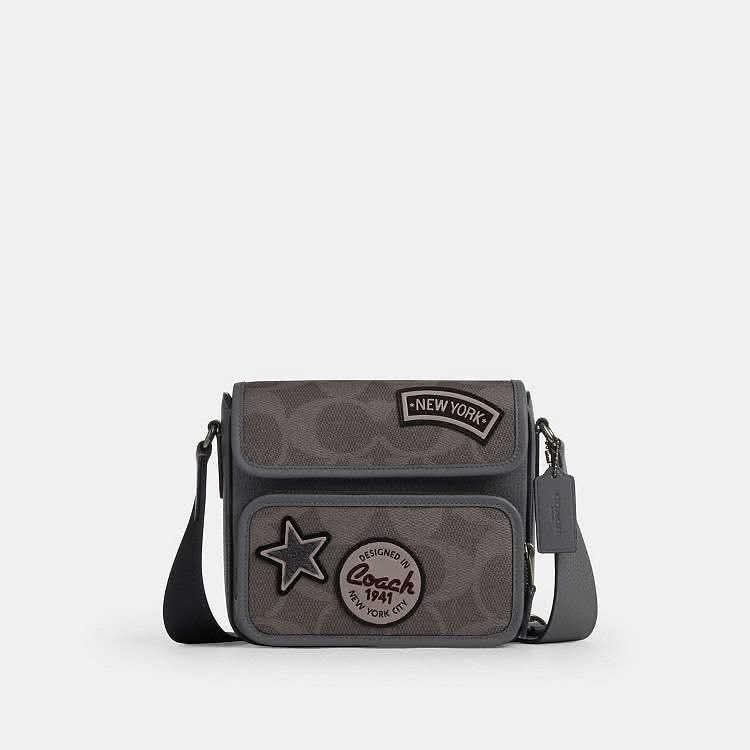 Coach Charter Crossbody Bag (Category: Luxury Bags & Wallets) located in Quezon City. Submitted by k2collection.mnl (Listing ID 1418951984, Image 1). Description: - Coach Charter crossbody bag - Color: Grey - Features: - Flap closure - "New York" patch - Star patch - Coach logo - Adjustable long strap - Interior: Black - Material: Grey leather and Coach signature pattern.
