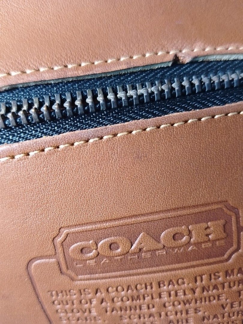 Coach Leather Handbag project bag (Category: Luxury Bags & Wallets) located in Manila. Submitted by decorasyon (Listing ID 1418853320, Image 3). Description: - Vintage Coach handbag - Brown leather - Top handle design - Zip closure - Includes leather tag - Interior zip pocket - Functional zipper.