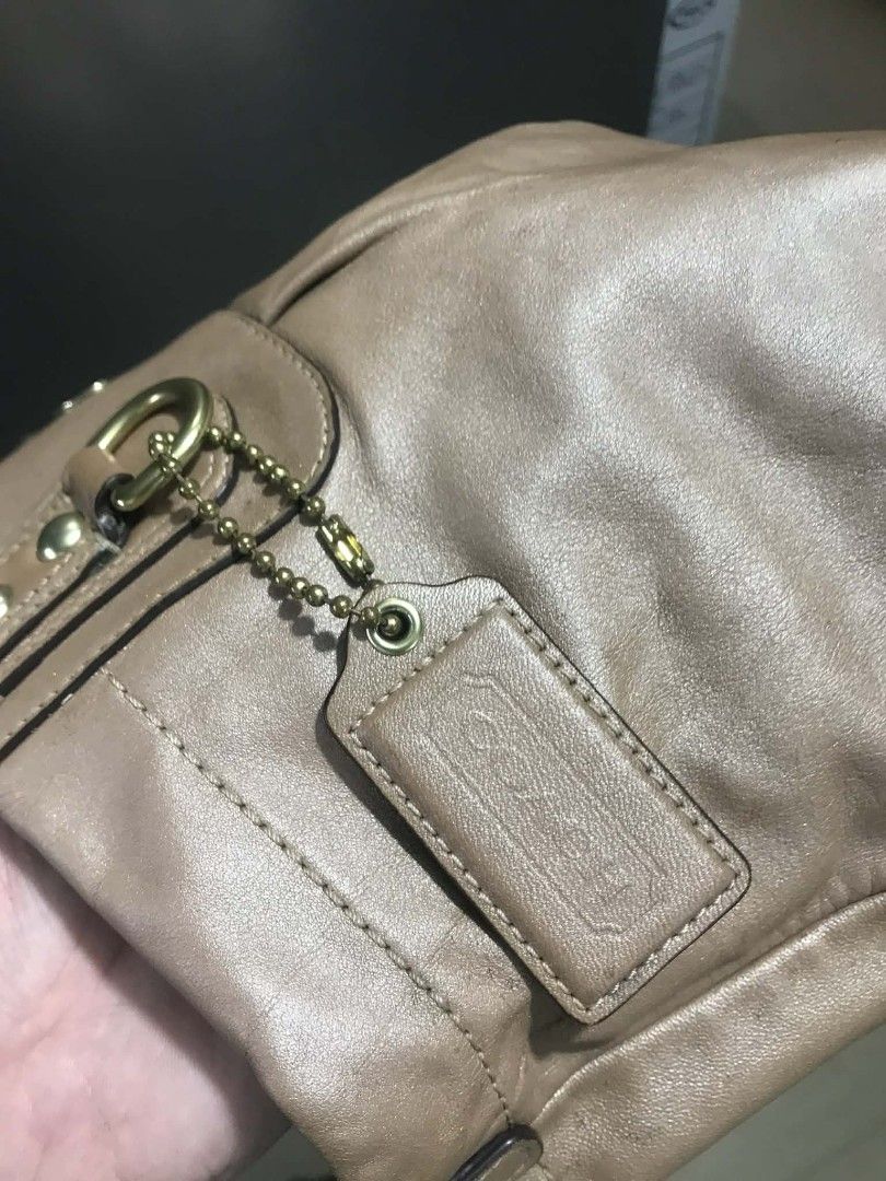 Coach Leather Handbag with Shoulder Strap (Category: Luxury Bags & Wallets) located in Manila. Submitted by kaloyyyyyy (Listing ID 1418780209, Image 2). Description: Authentic Vintage Coach Leather Tote/Crossbody Bag Brand: Coach Style Number: NPD1160-713613 Material: Soft full-grain cowhide leather (taupe/brown tone) Hardware: Brass-toned metal fittings Features: - Dual top handles + removable adjustable crossbody strap (for versatile wear) - Si