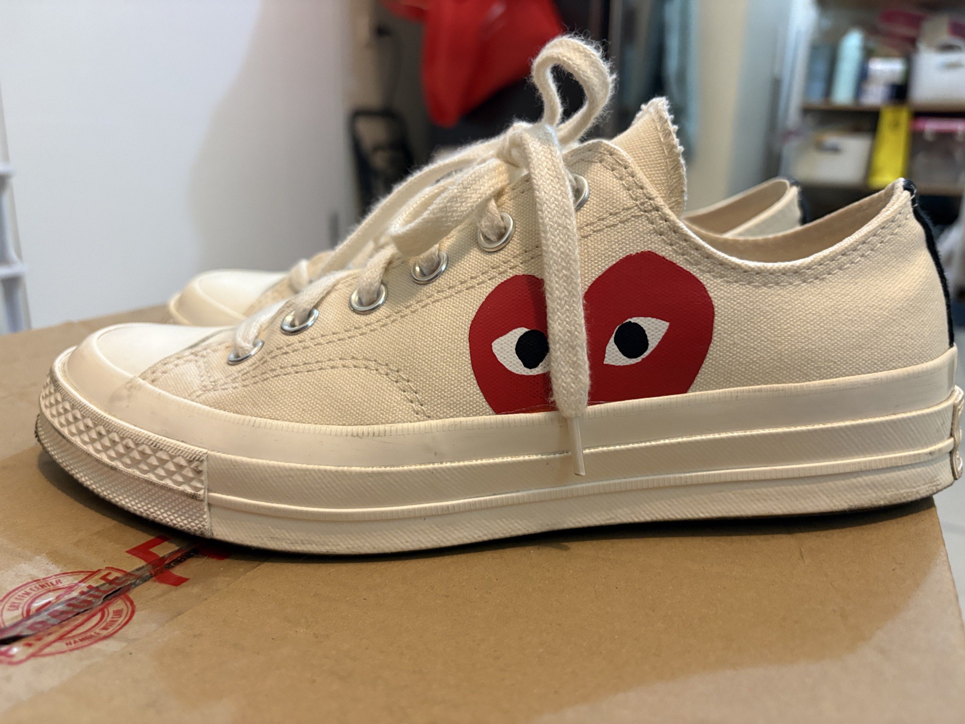 Comme des Garcons Play x Converse Chuck 70 (Size W9) (Category: Sneakers) located in Pasig City. Submitted by indigo033 (Listing ID 1418915491, Image 1). Description: ✔️ Authentic Converse x Comme des Garçons ✔️ Color: Beige ✔️ Condition: Slightly used, just needs a little bit of cleaning Details: • Women’s size 9 • No box (but can provide a different shoe box if needed) 🏷️ Price is negotiable.