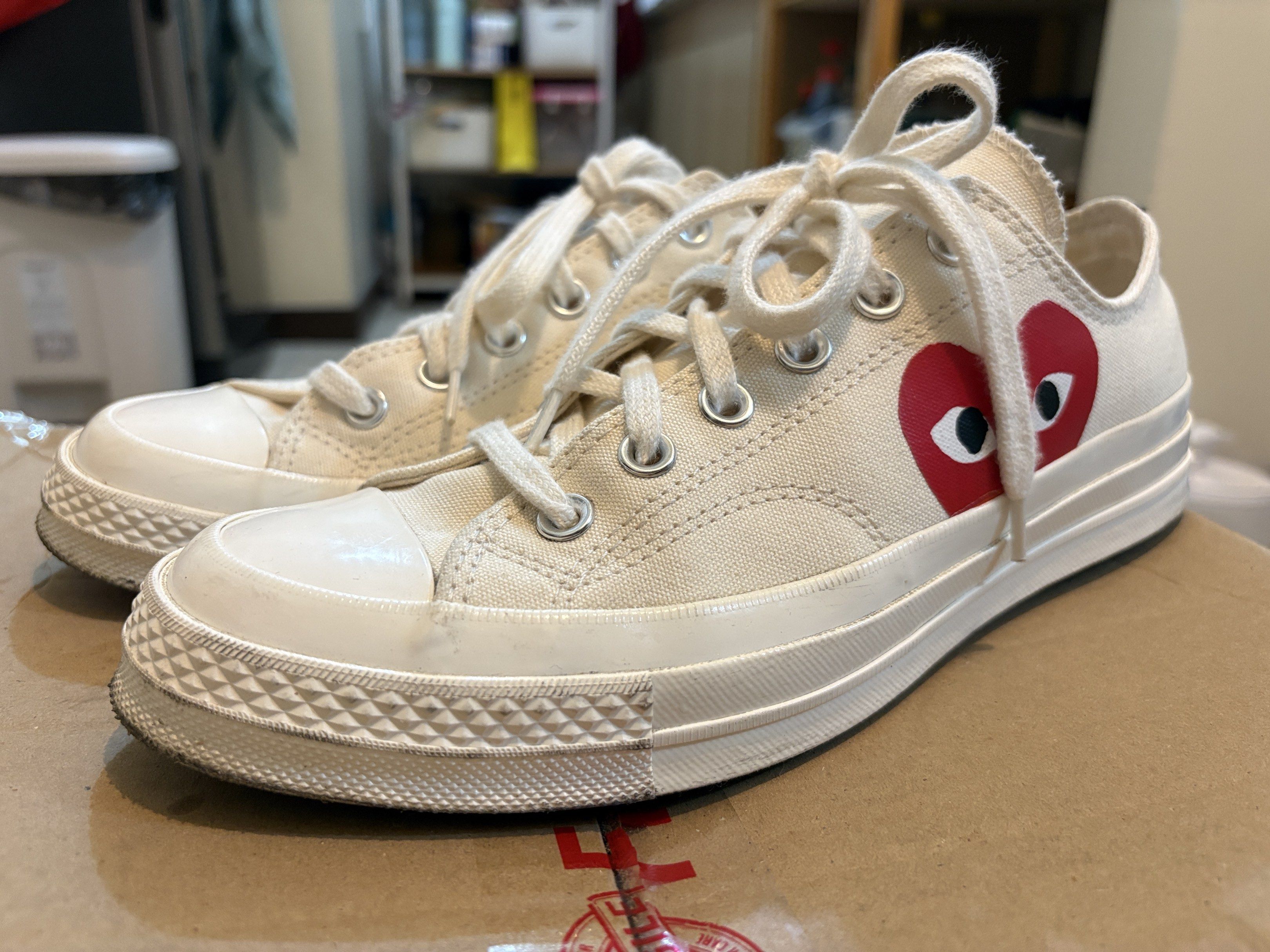 Comme des Garcons Play x Converse Chuck 70 (Size W9) (Category: Sneakers) located in Pasig City. Submitted by indigo033 (Listing ID 1418915491, Image 2). Description: ✔️ Authentic Converse x Comme des Garçons ✔️ Color: Beige ✔️ Condition: Slightly used, just needs a little bit of cleaning Details: • Women’s size 9 • No box (but can provide a different shoe box if needed) 🏷️ Price is negotiable.