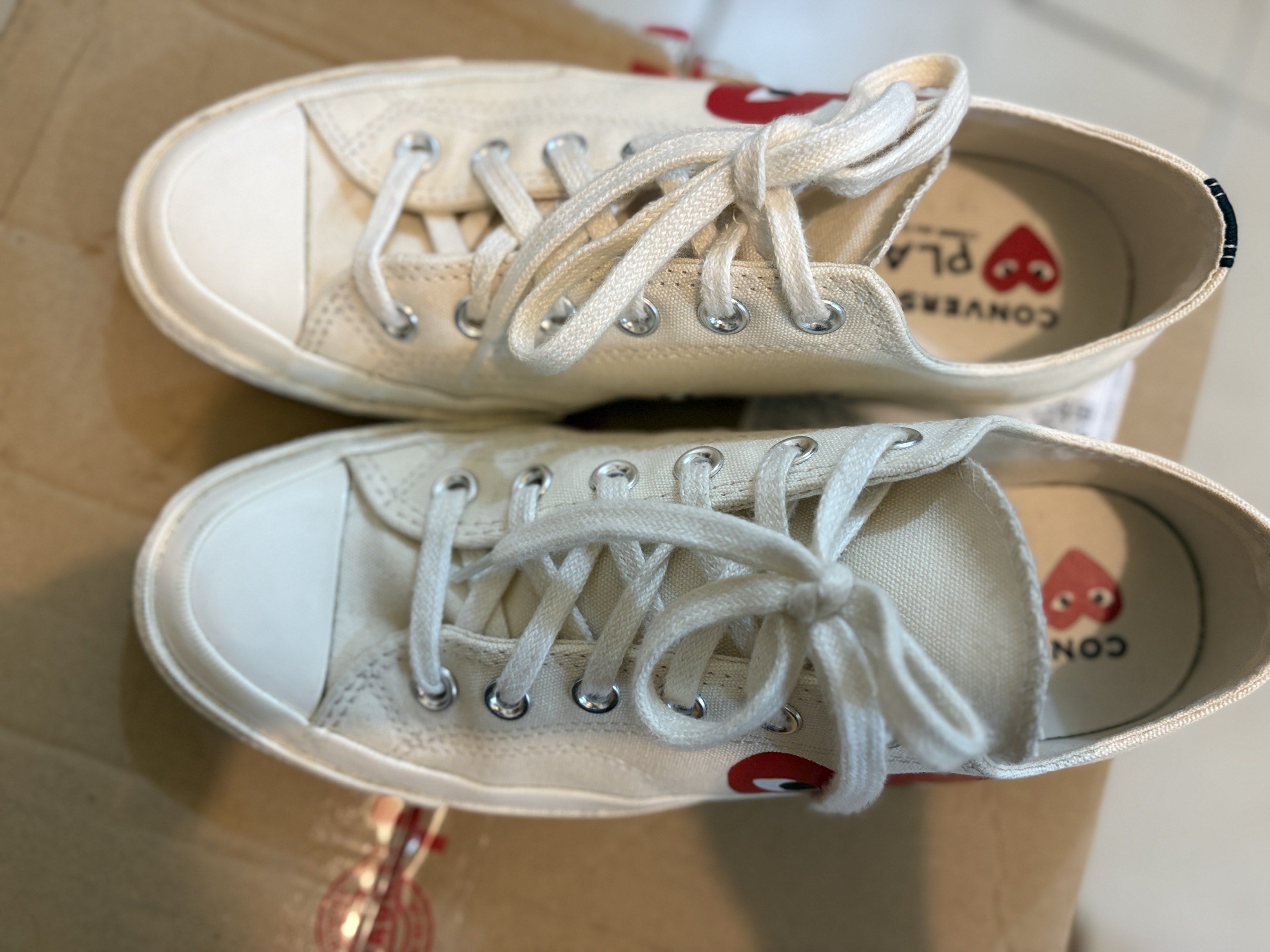Comme des Garcons Play x Converse Chuck 70 (Size W9) (Category: Sneakers) located in Pasig City. Submitted by indigo033 (Listing ID 1418915491, Image 3). Description: ✔️ Authentic Converse x Comme des Garçons ✔️ Color: Beige ✔️ Condition: Slightly used, just needs a little bit of cleaning Details: • Women’s size 9 • No box (but can provide a different shoe box if needed) 🏷️ Price is negotiable.