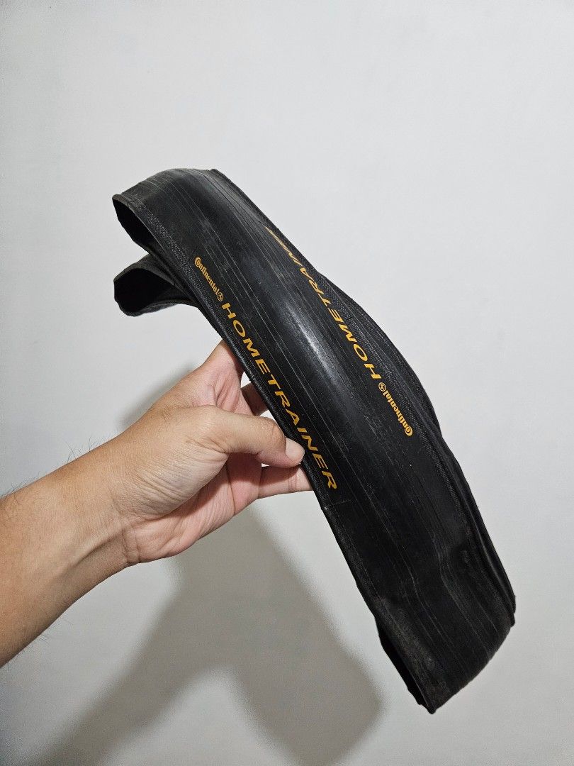 Continental Home Trainer Tire 700x32c Folding (Category: Bicycles) located in San Pedro. Submitted by _falafelz (Listing ID 1418893286, Image 2). Description: CONTINENTAL HOME TRAINER 700x32c NOT FOR ROAD USE! ONLY FOR INDOOR TRAINER 1 PIECE ONLY -MODEL: HOMETRAINER -MADE IN: Germany -COLOR: BLACK -SIZE: 700x32C -Desianed to withstand the unique forces generated by INDOOR TRAINERS -No abraided rubber on the floor -Compound especially resistant to
