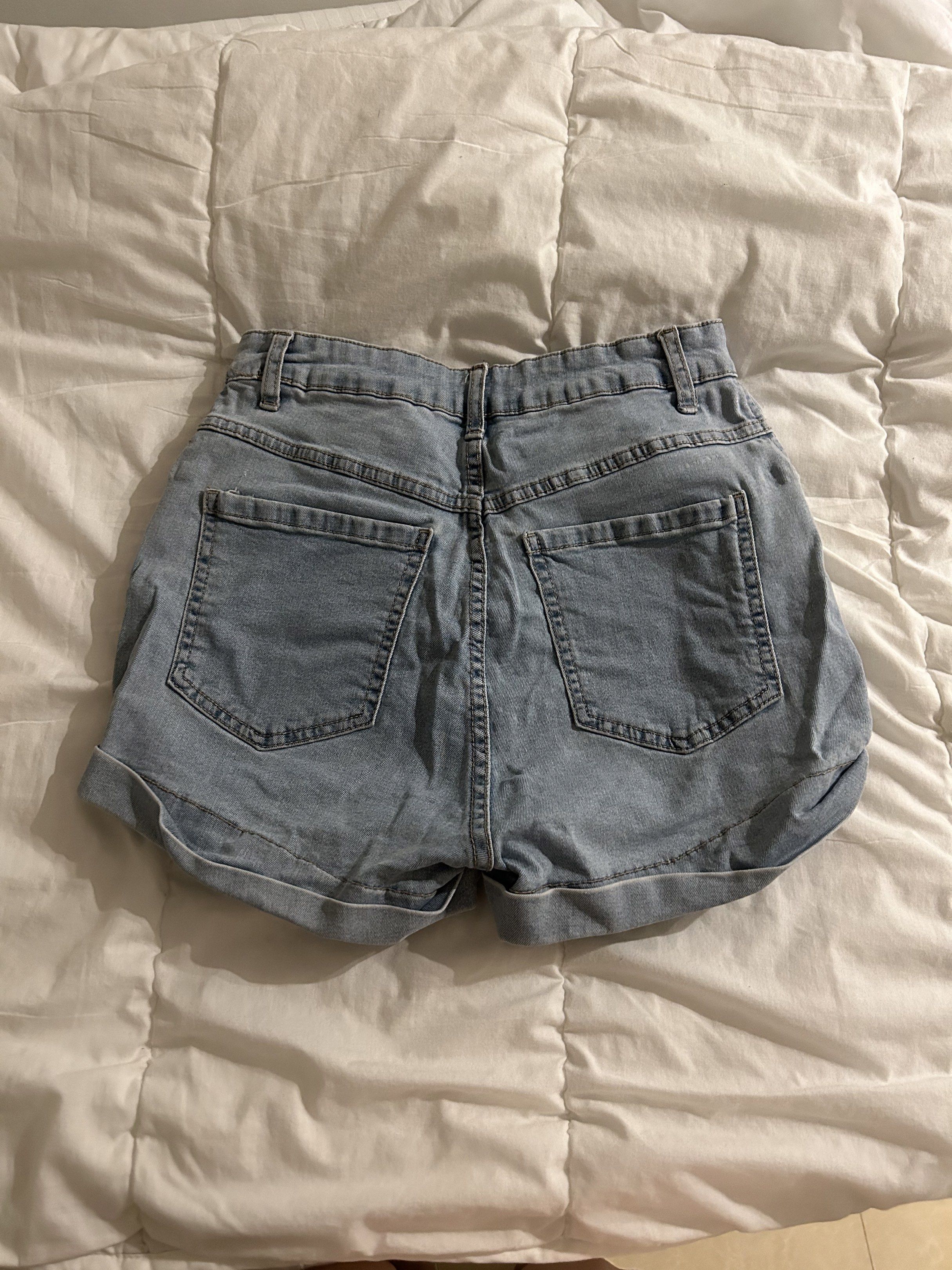 Cotton On Denim Shorts - Size 4 (Category: Shorts) located in Calamba. Submitted by baskybears (Listing ID 1418925183, Image 3). Description: - Cotton On denim shorts - Light wash - High-waisted - Button-fly closure - Size 4.