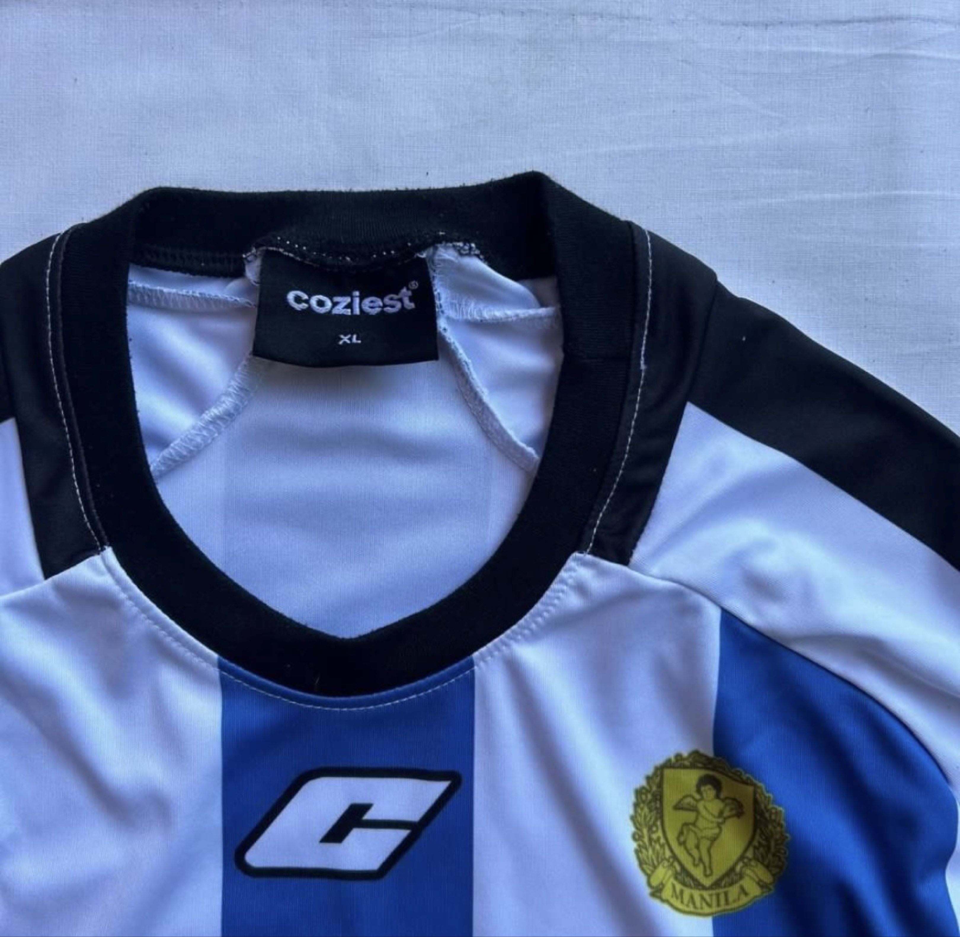 Coziest Football Jersey (Category: Tshirts & Polo Shirts ) located in Cabuyao City. Submitted by steezy.333 (Listing ID 1418906792, Image 2). Description: condition: 10/10 color: 10/10 L27, W24 (length, width) Buyer will handle the SF!!! - 4x lang nagamit (good as new) -nego sa sure buyer.