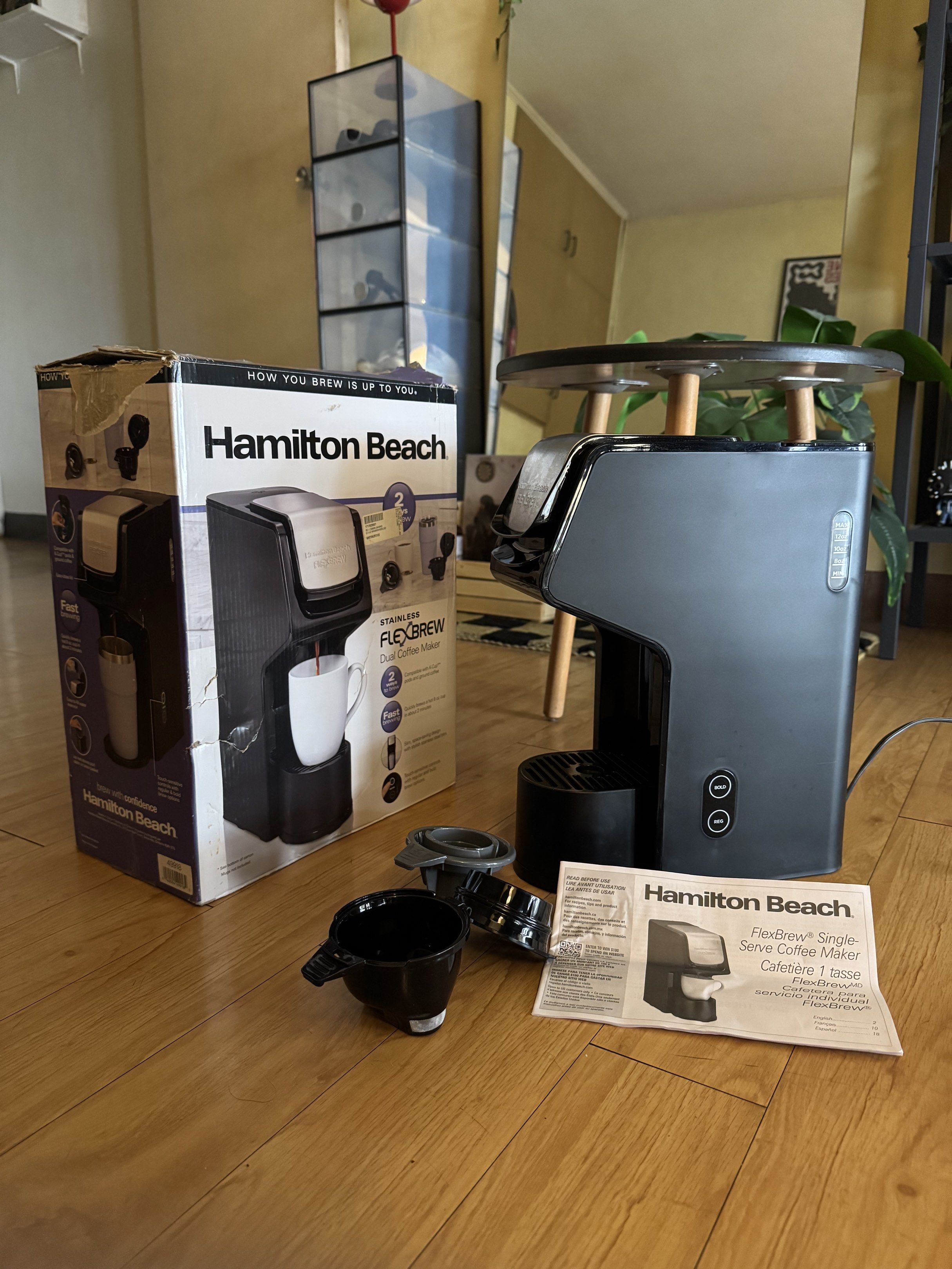 Hamilton Beach FlexBrew Dual Coffee Maker (Category: Coffee Machines & Makers) located in Bacoor. Submitted by dayglow777 (Listing ID 1418830721, Image 1). Description: Rfs: requires 120 volts, 900-1400 watts transformer - Compatible with K-Cup pods and ground coffee. - Includes original box, parts, and manual. Honest Issue: Broken cover of water compartment (see last pic) .