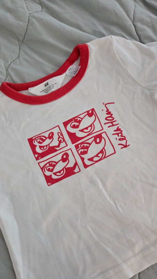 H&M Keith Haring Mickey Mouse T-shirt (Category: Babies & Kids Fashion) located in Quezon City. Submitted by wikimamad (Listing ID 1418832089, Image 2). Description: - H&M T-shirt - Features a Keith Haring design with Mickey Mouse - White with red trim - Crew neck and short sleeves - Size: 2-3 years - Graphic print on the front.