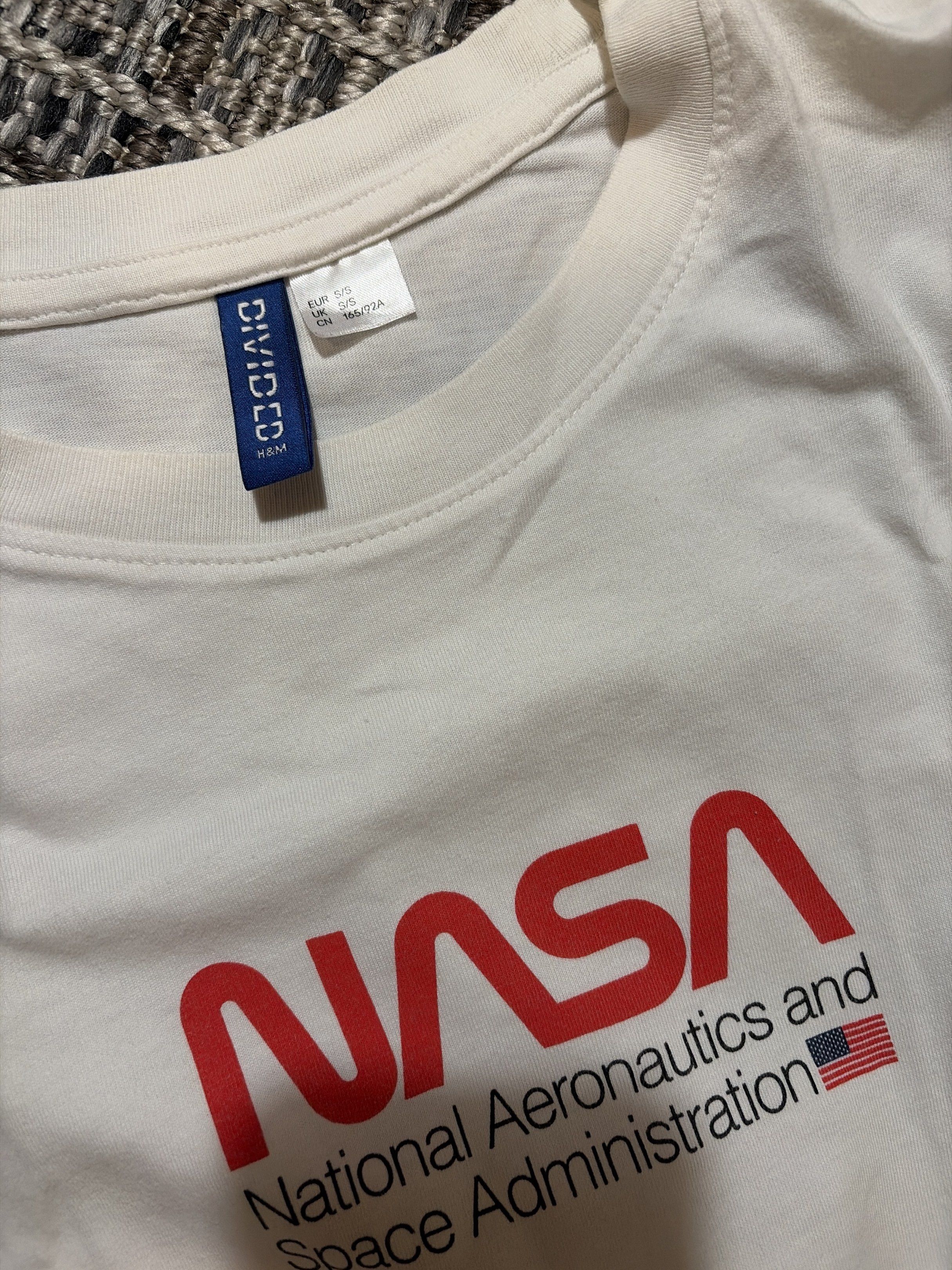 H&M NASA Long Sleeve Shirt (Category: Tshirts & Polo Shirts ) located in Manila. Submitted by enzoic (Listing ID 1418890318, Image 2). Description: - NASA logo also printed on the left sleeve - Size visible in the image.