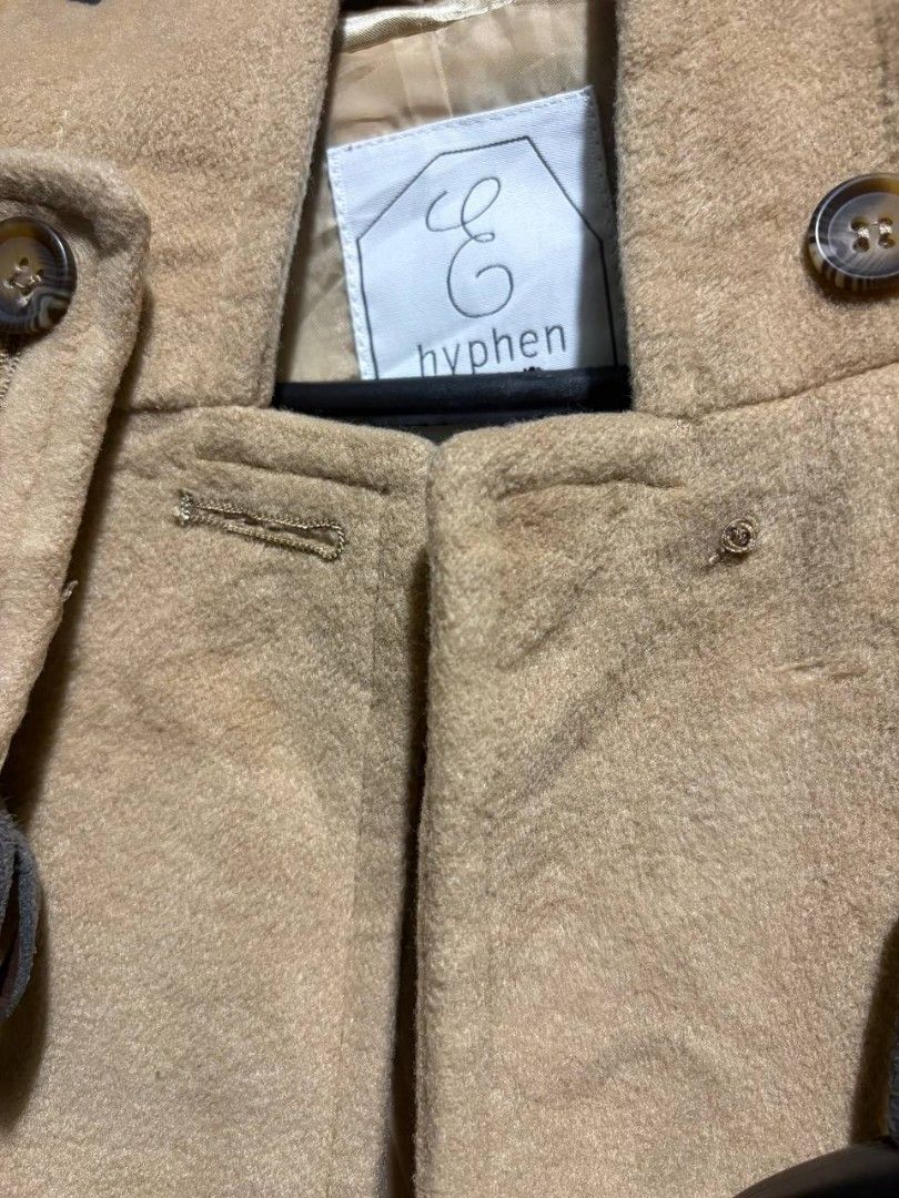 Hyphen wool Coat with Hood (Category: Coats, Jackets and Outerwear) located in Manila. Submitted by Rhidell (Listing ID 1418816060, Image 2). Description: - khaki colored duffle/wool coat; worn only once - will fit xs-small frame may be tight for medium - Light brown color - Hooded (not removeable) - Two front pockets - Button closure at collar - Soft, possibly wool-blend material - Perfect for cooler weather -missing top button as shown in photo
