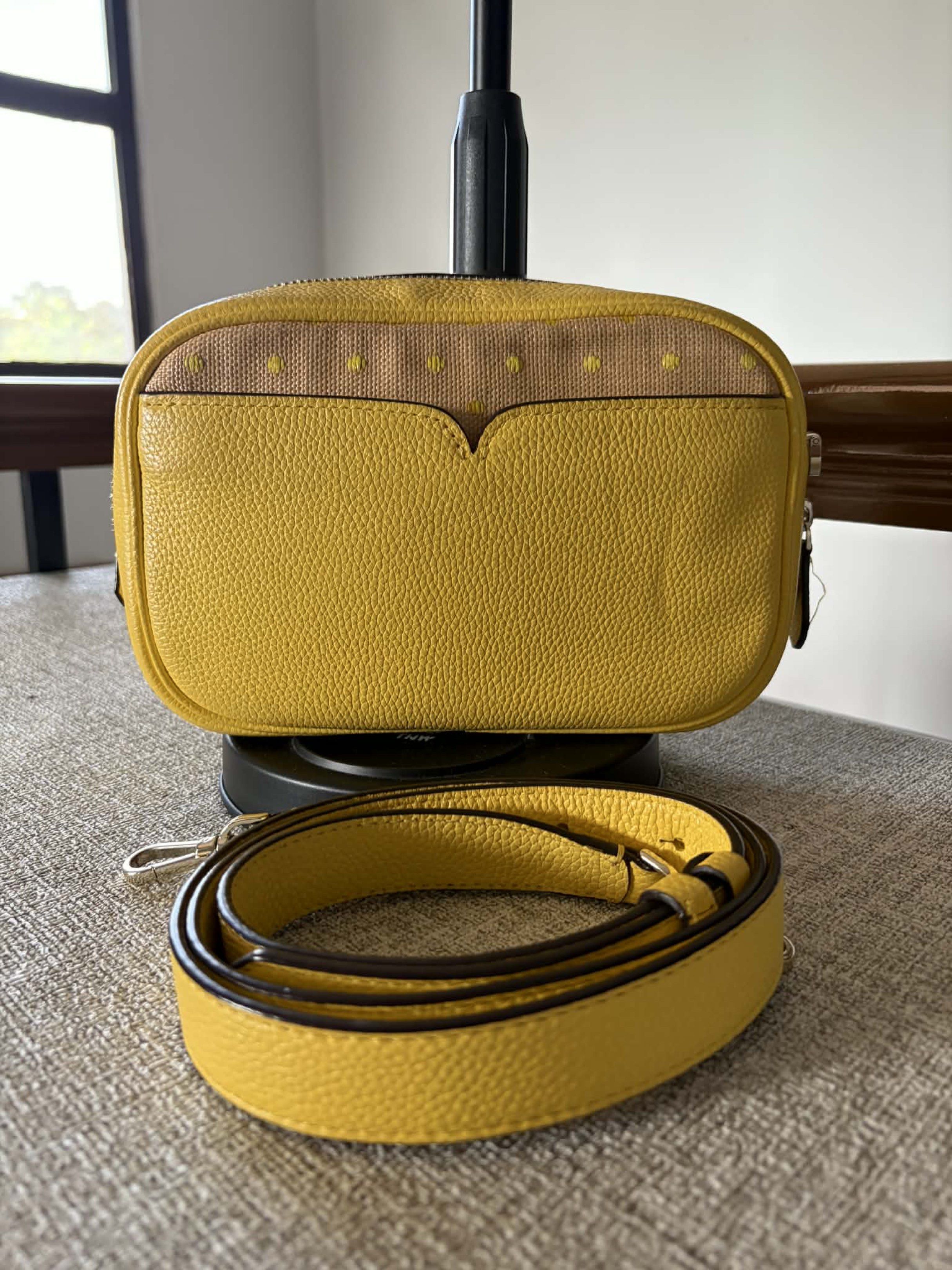 Kate Spade Astrid Raffia Medium Crossbody Camera Bag (Category: Luxury Bags & Wallets) located in Dasmarinas. Submitted by melram83 (Listing ID 1418828606, Image 2). Description: 8.25” x 5.25” x 2.5” Flaw: small dot, see top view photo With inside zip pocket and outside back pocket Detachable and adjustable thick strap .