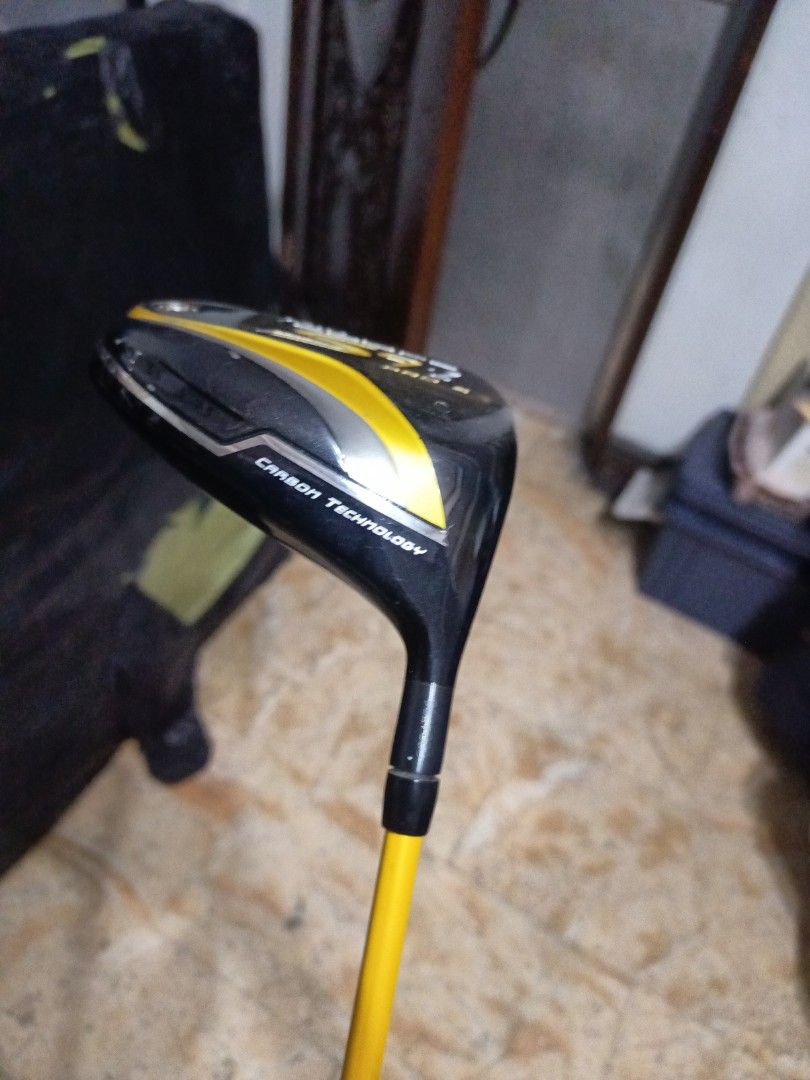 King Cobra S9-1 Pro S Golf Driver (Category: Golf) located in Manila. Submitted by yeonmei5614747 (Listing ID 1418868972, Image 2). Description: King Cobra S9-1 Pro S golf driver. Features a black club head with yellow accents. The shaft is yellow and has "Fujikura" printed on it. The grip is black. The club head has "6.5" printed on it. The club head also has "Carbon Technology" printed on it. X flex Righty.