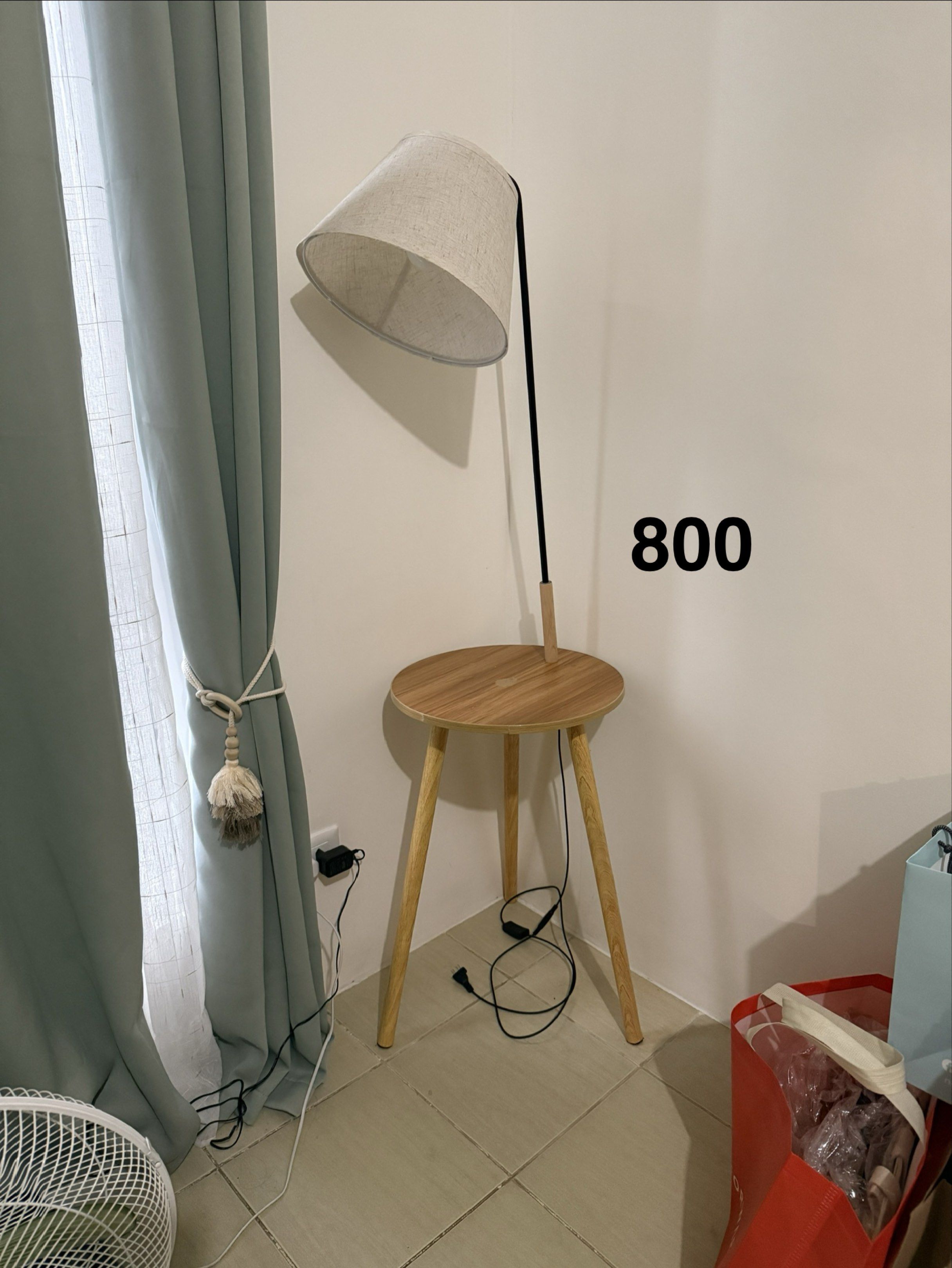 Lamp with Table, declutter side table (Category: Tables & Sets) located in Cavite. Submitted by hnnhcrml (Listing ID 1418785112, Image 1). Description: Slight damage to table top, lamp is working fine..