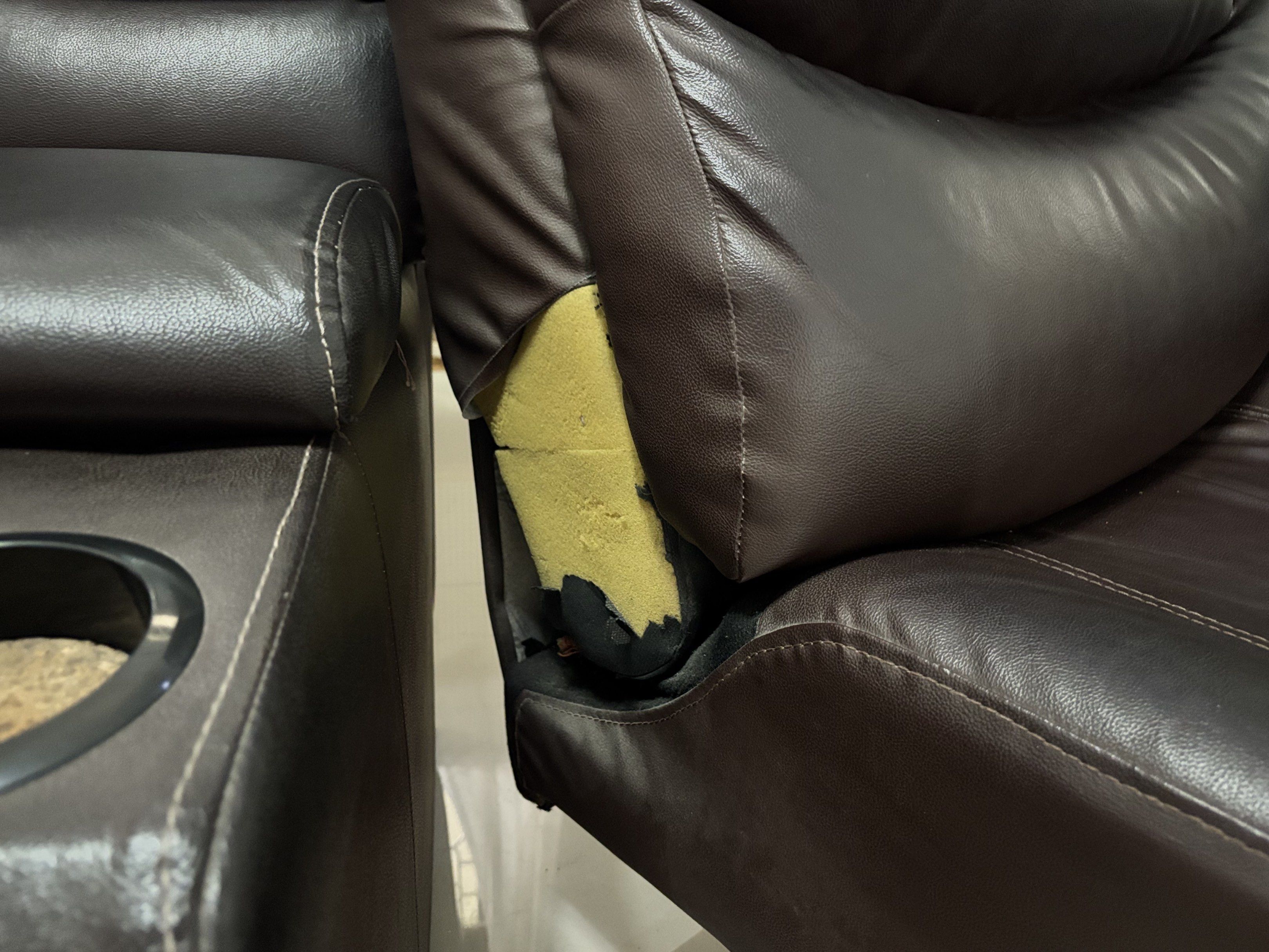 Leather Reclining Sofa with Cup Holders (Category: Sofas) located in Quezon City. Submitted by tinymommy_ (Listing ID 1418076120, Image 3). Description: - Two-seater reclining sofa - Built-in cup holders - Detachable - Padded armrests and headrests - Working well.