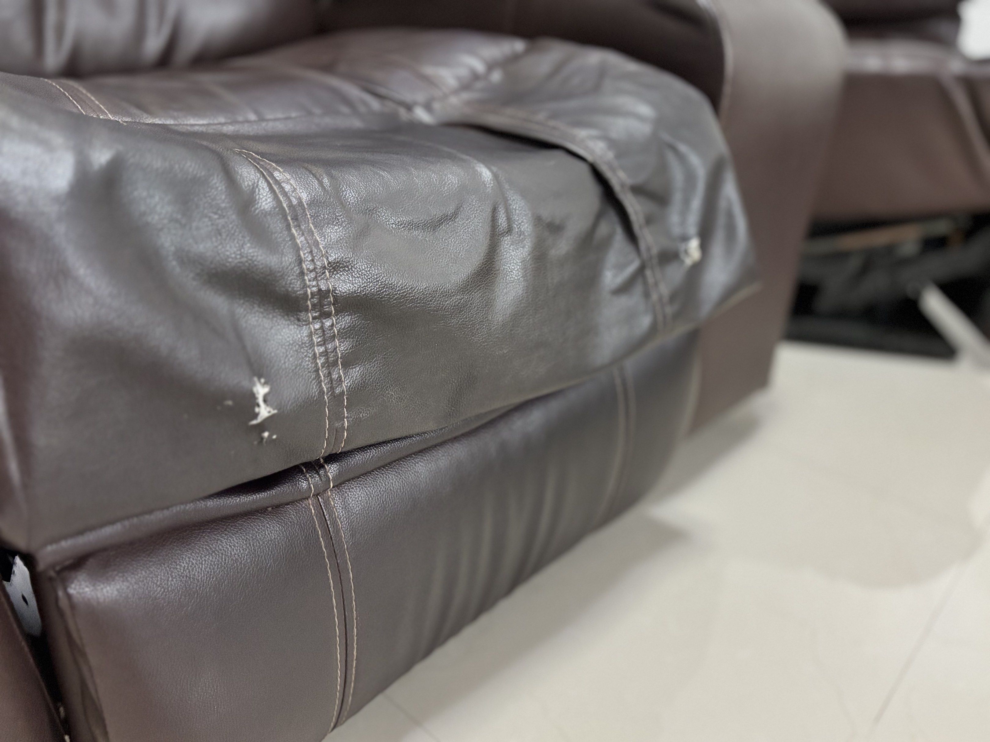 Leather Reclining Sofa with Cup Holders (Category: Sofas) located in Quezon City. Submitted by tinymommy_ (Listing ID 1418076120, Image 2). Description: - Two-seater reclining sofa - Built-in cup holders - Detachable - Padded armrests and headrests - Working well.