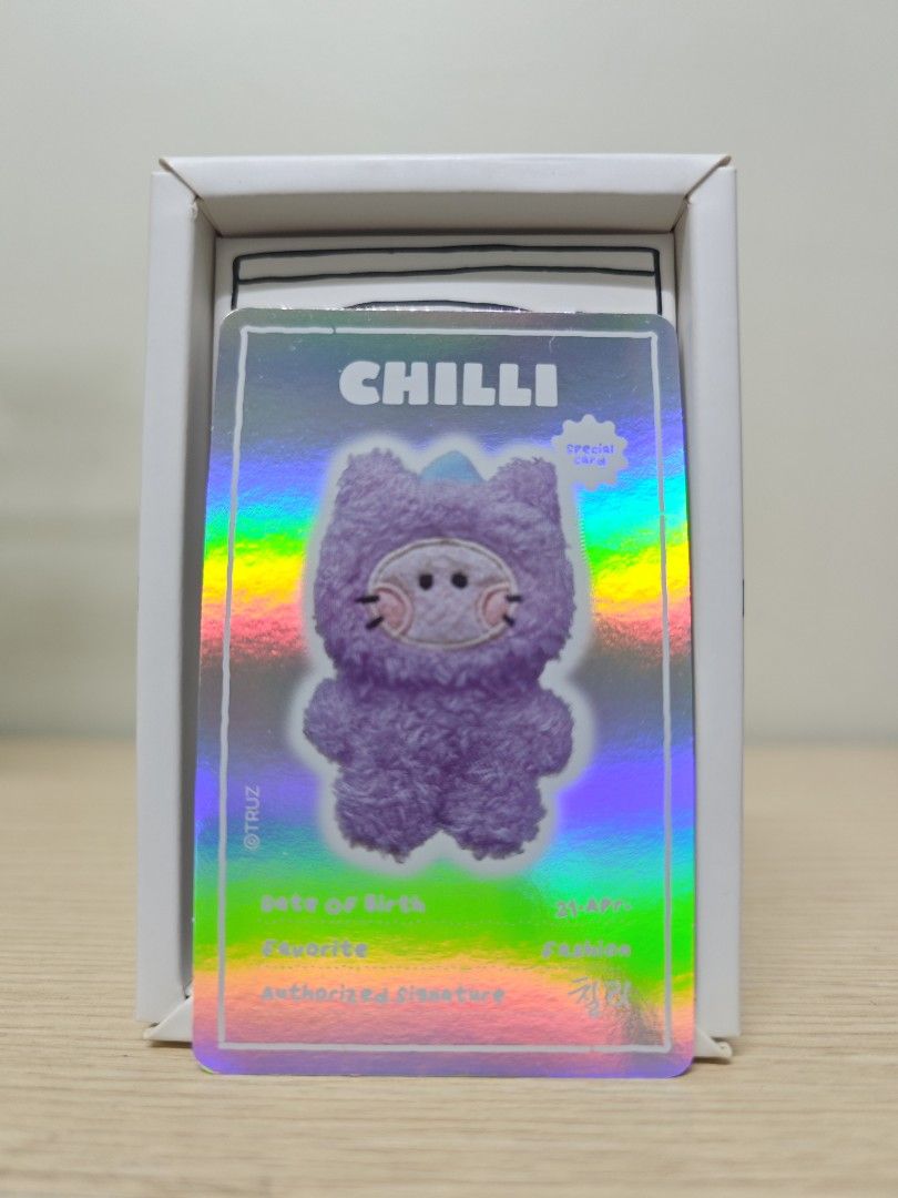 TRUZ CHILLI Mini minini Doll (Category: Designer & Blind Box Toys) located in Taguig. Submitted by hellojuly (Listing ID 1418893277, Image 3). Description: Treasure Truz Mini Minini (Chilli) - Comes with original box and holographic card - Bought in Line Friends Korea - Fits perfectly for your Teulight!.