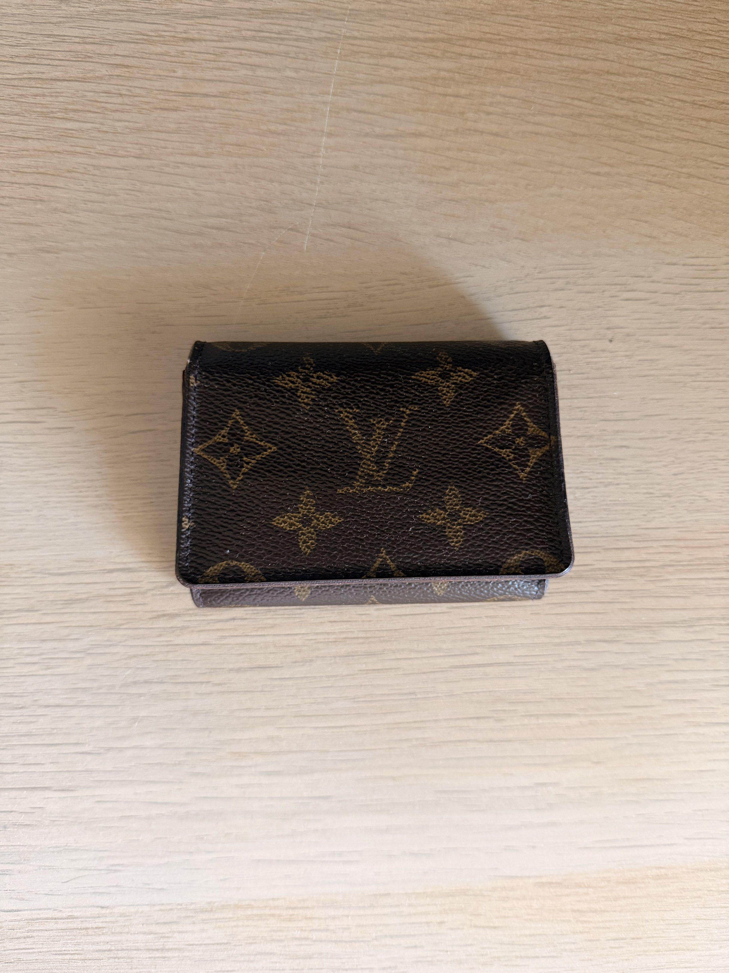 Original Louis Vuitton Card Holder (Category: Luxury Bags & Wallets) located in Manila. Submitted by ellede32655 (Listing ID 1418779029, Image 1). Description: - Authentic Louis Vuitton card holder - Classic Monogram canvas - Brown leather interior - Multiple card slots - Compact and stylish - Features the iconic LV monogram Bought from Don quijote Japan - Includes Louis Vuitton logo.