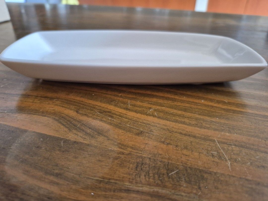 Lucerne Serving Dish - Rectangular (Category: Other Kitchenware & Tableware) located in Singapore. Submitted by miqmattsgp (Listing ID 1418869619, Image 1). Description: Elegant rectangular serving dish by Lucerne. Perfect for appetizers, snacks, or small dishes. Features a clean, minimalist design. 23cm x 10cm x 2.5cm Multiple lots of 4 pieces available .