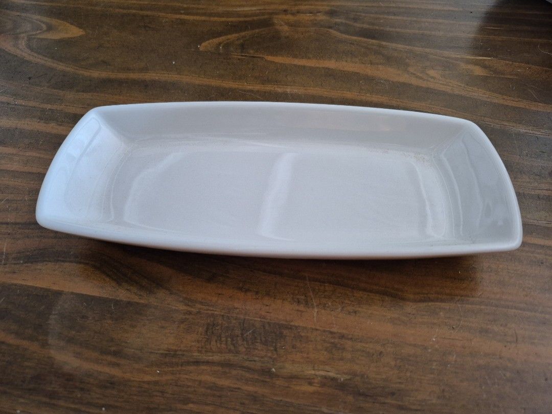 Lucerne Serving Dish - Rectangular (Category: Other Kitchenware & Tableware) located in Singapore. Submitted by miqmattsgp (Listing ID 1418869619, Image 2). Description: Elegant rectangular serving dish by Lucerne. Perfect for appetizers, snacks, or small dishes. Features a clean, minimalist design. 23cm x 10cm x 2.5cm Multiple lots of 4 pieces available .