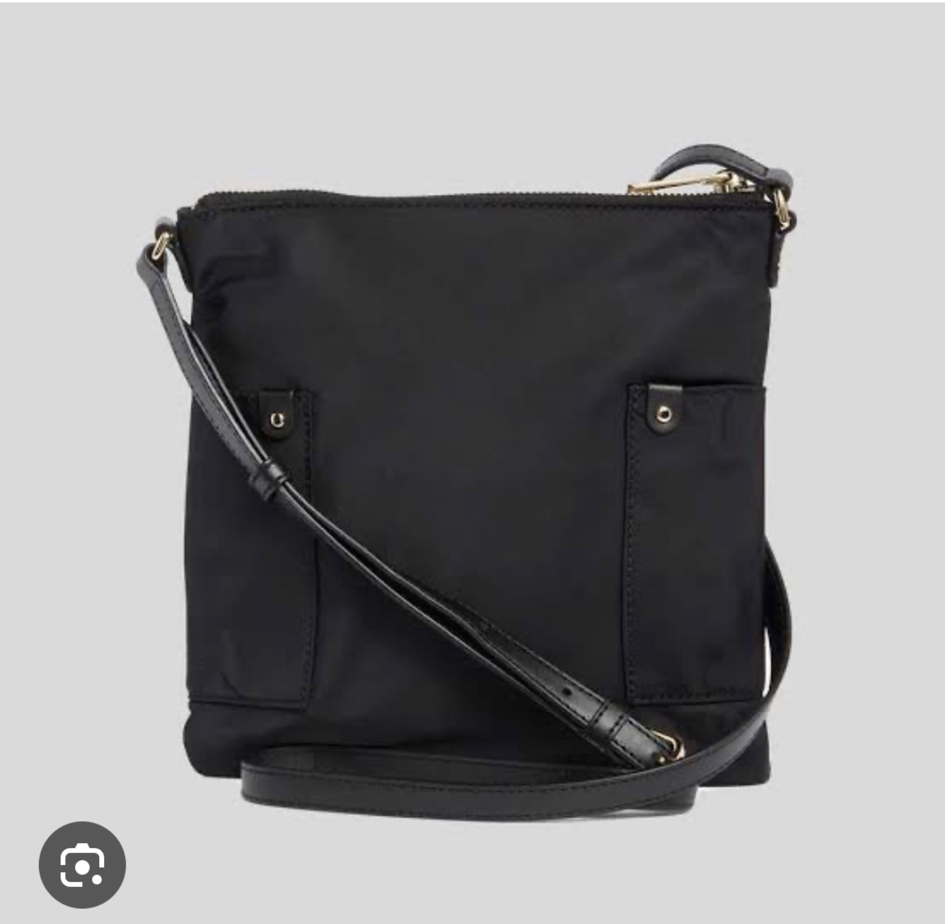Marc Jacobs Preppy Swing Pack Crossbody Bag (Category: Luxury Bags & Wallets) located in Manila. Submitted by jcmph (Listing ID 1418793406, Image 2). Description: Marc Jacobs Preppy Swing Pack crossbody bag is black and features a top zip closure. It has a polyester material with polyurethane trim. The bag includes a strap and multiple pockets. It comes with tags and original packaging. The bag's dimensions are approximately 9 1/2" H x 9" W x 1 1