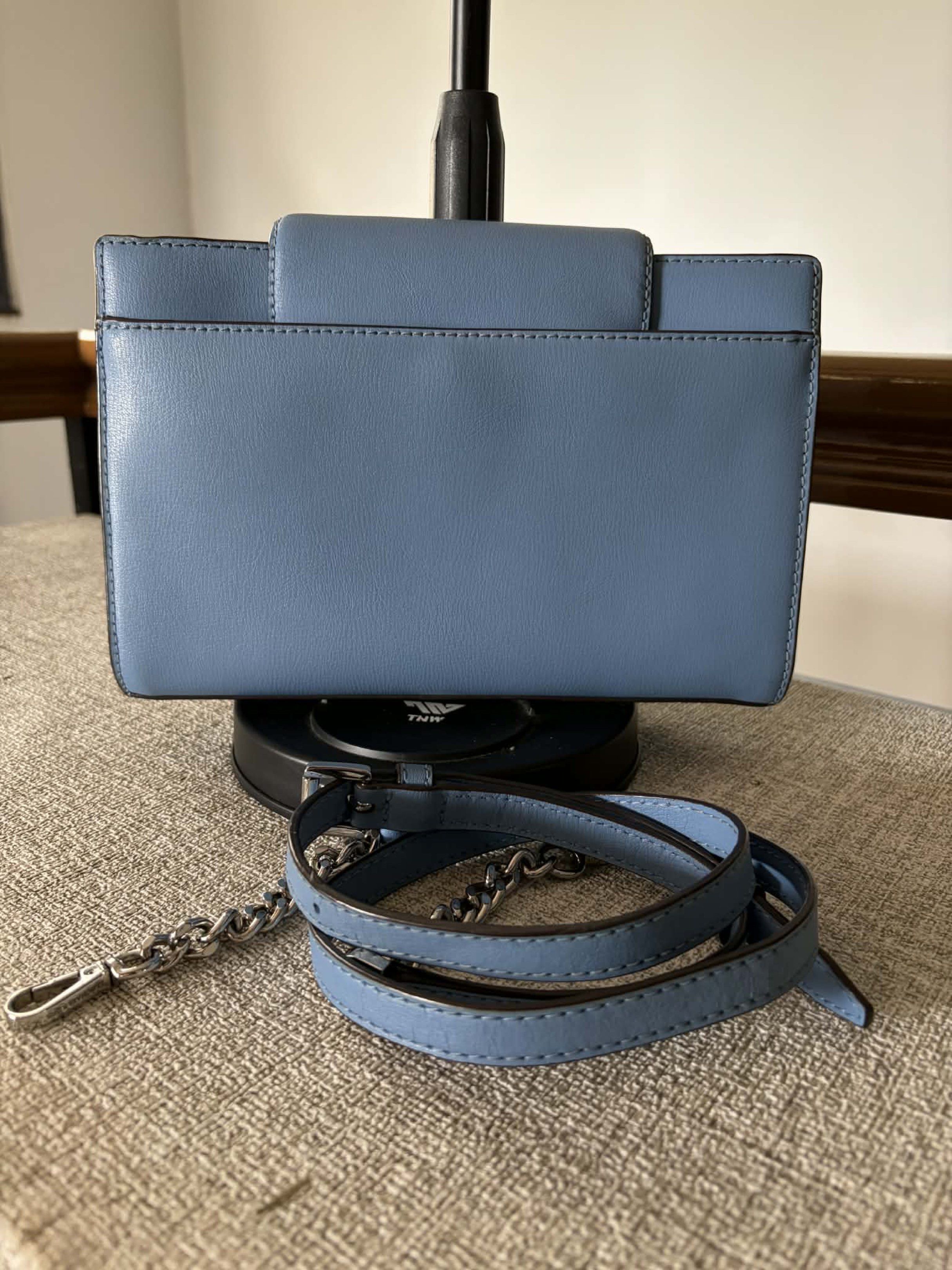 Michael Kors Mott Large Crossbody Bag (Category: Luxury Bags & Wallets) located in Dasmarinas. Submitted by melram83 (Listing ID 1418829962, Image 2). Description: 10”x 5” x 2” With back pocket Inside: zip pocket, open pocket and card holder Removable adjustable strap Flaw: small stain in front (see photo).