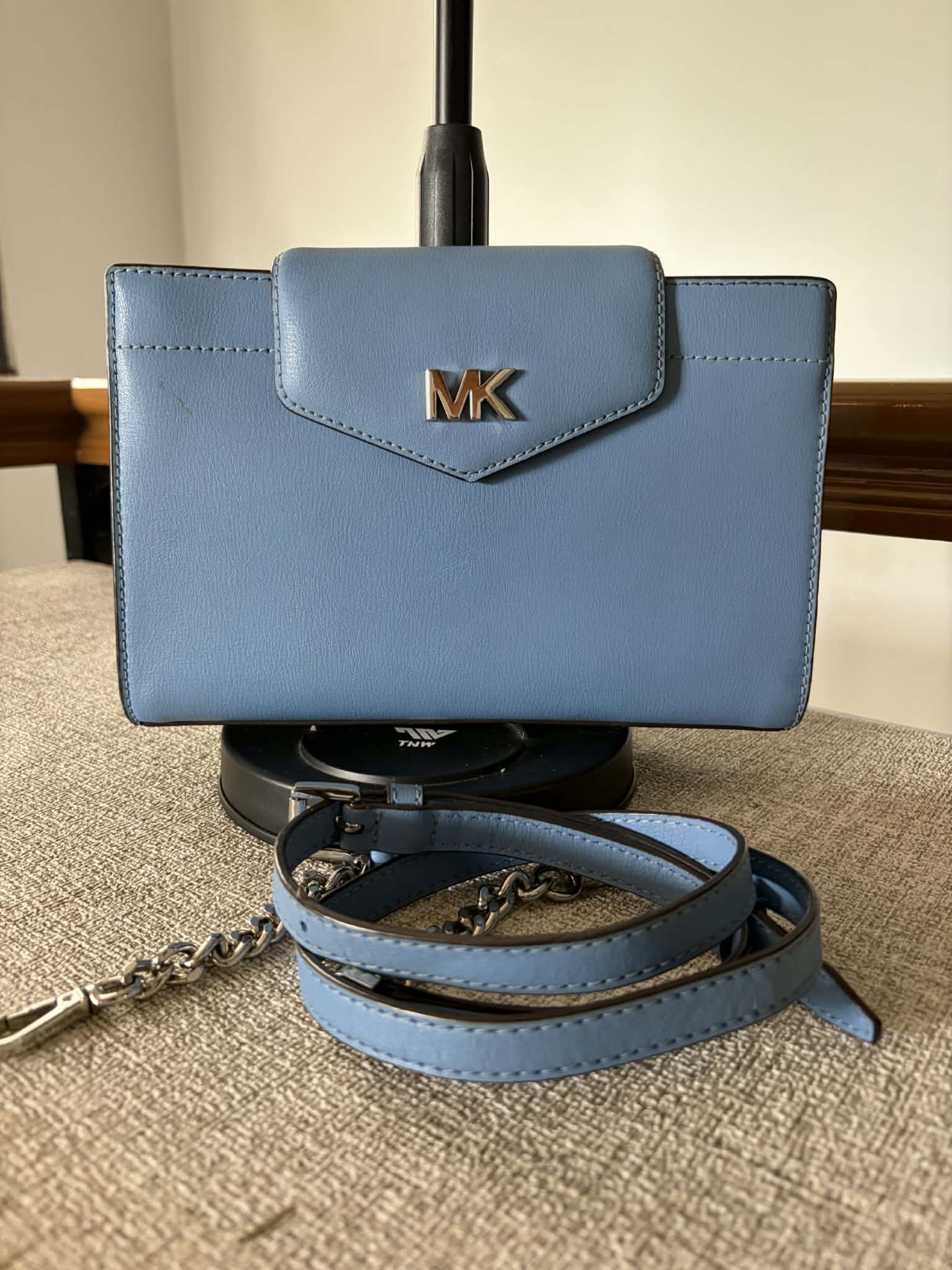 Michael Kors Mott Large Crossbody Bag (Category: Luxury Bags & Wallets) located in Dasmarinas. Submitted by melram83 (Listing ID 1418829962, Image 1). Description: 10”x 5” x 2” With back pocket Inside: zip pocket, open pocket and card holder Removable adjustable strap Flaw: small stain in front (see photo).