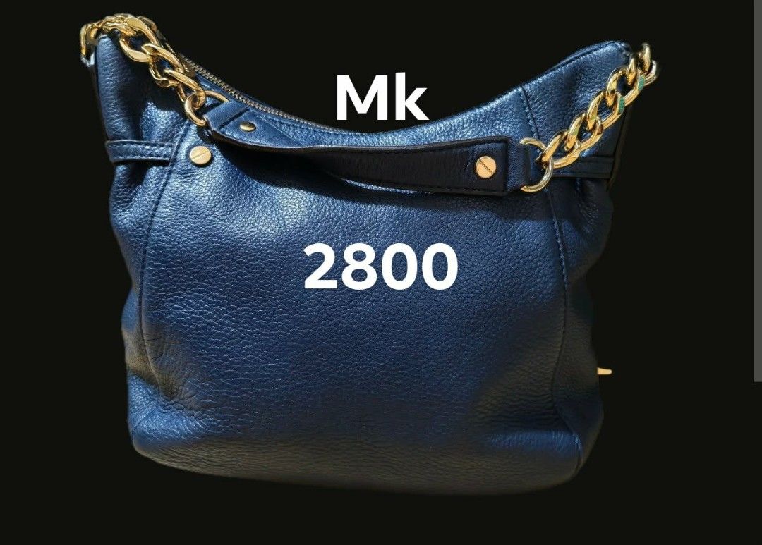 Mk original bag (Category: Luxury Bags & Wallets) located in Manila. Submitted by gentleeagle.20ae58 (Listing ID 1418943721, Image 1). Description: Michael kits bag navy blue Guaranteed original.