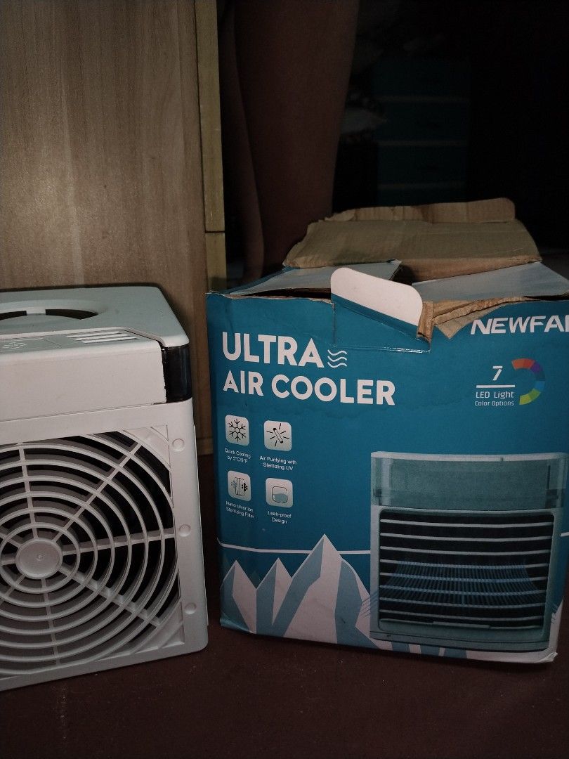 Newfan Ultra Air Cooler (Category: Air Conditioning and Heating) located in Manila. Submitted by bal.jon (Listing ID 1418942517, Image 1). Description: : gumagana siya. : need punasan kasi na stock na siya that's why may mga dirts but natatanggal naman. .