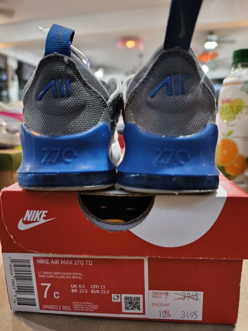Nike Air Max 270 TD - Grey/Blue (Category: Babies & Kids Fashion) located in Silang. Submitted by trufflesbee (Listing ID 1418881891, Image 2). Description: - Nike Air Max 270 TD - Color: Grey and Blue - Size: 7C (US), 6.5 (UK), 13 CM, 23.5 EUR - Features Air 270 logo on tongue and heel - Mesh upper - Blue heel accent - Comes with original box.