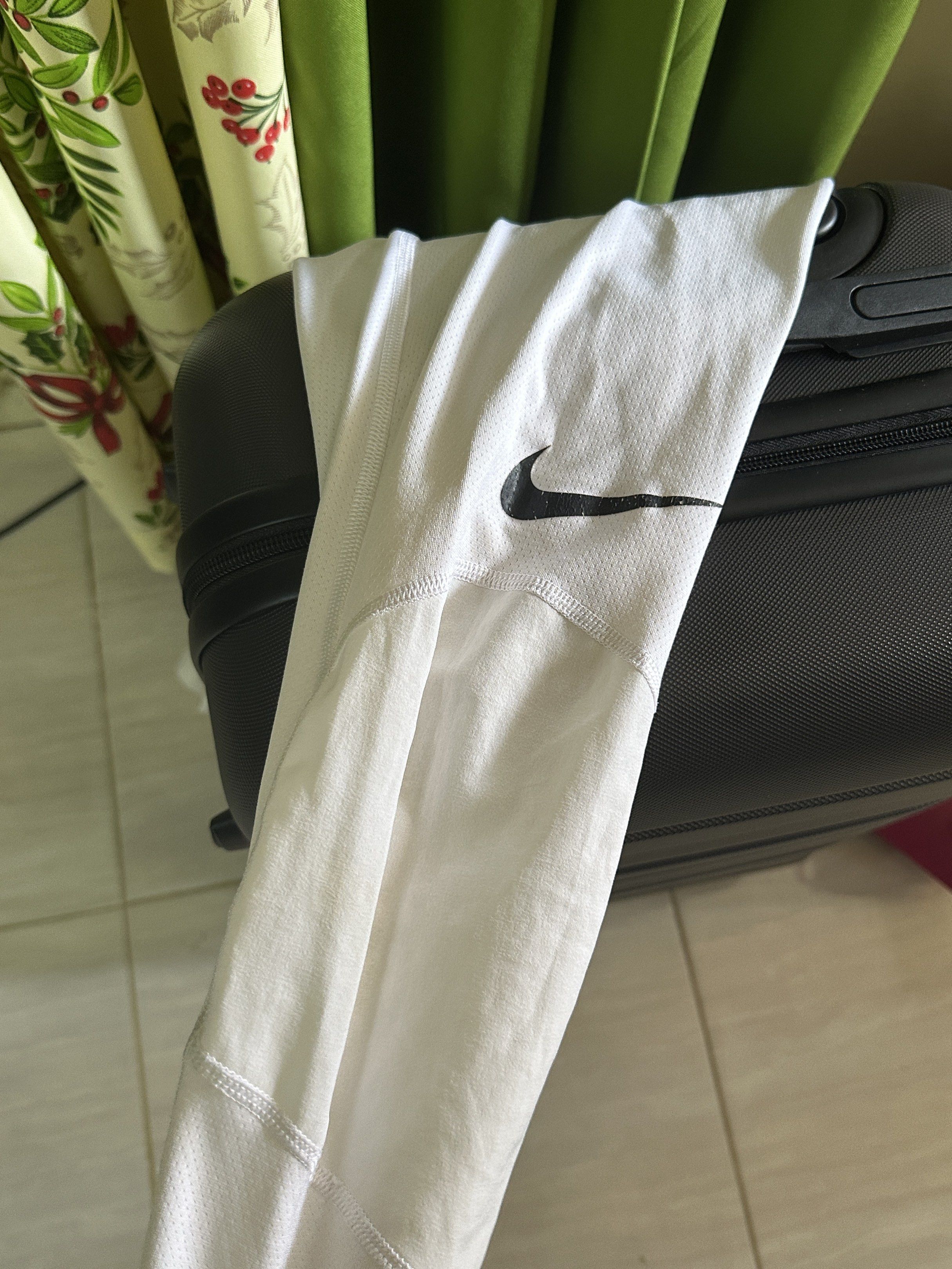 Nike Pro White Mens Dri-Fit Compression (Category: Activewear) located in Davao. Submitted by bydonbu (Listing ID 1418838044, Image 3). Description: - Nike Pro 3/4 leggings - Color: White - Black waistband with Nike Pro logo - Nike swoosh logo on leg - Made of breathable, athletic material - Perfect for workouts and casual wear - Used for basketball - No issues.