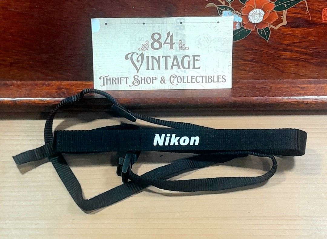 Nikon Original Camera Strap (Category: Camera Bags & Carriers) located in Las Pinas. Submitted by 84vintage (Listing ID 1418842138, Image 1). Description: Actual photos posted. Please examine them carefully as they are part of the description. --📌 MUST READ Before Dealing with us 📌-- ⚠️Price is posted. No lowballs please. ⚠️Vintage items are only sold As Is Where Is. If you want new items without any flaws, you can buy at the mall. Please manag