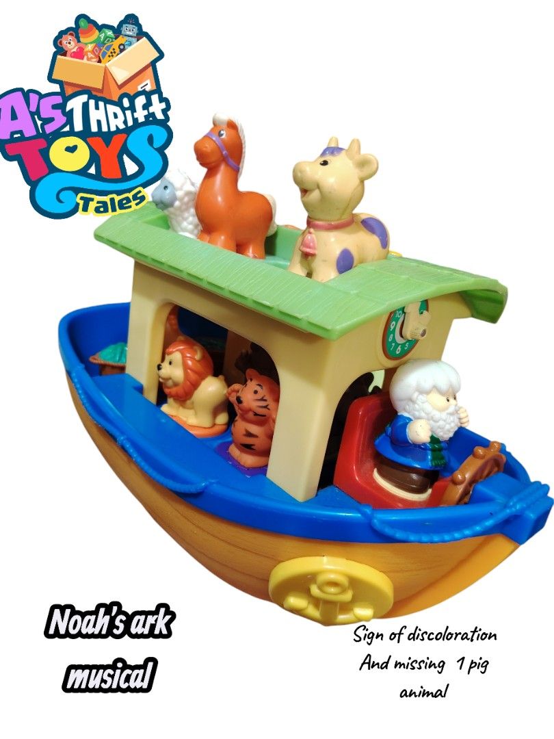 Noah's Ark Musical Toy (Category: Educational & Learning Toys) located in Iligan City. Submitted by shehabdor98515 (Listing ID 1418971201, Image 1). Description: - Musical Noah's Ark toy - Includes animal figures: horse, sheep, cow, lion, and tiger - Missing one pig figure - Ark features: - Green roof - Clock detail - Noah figure.