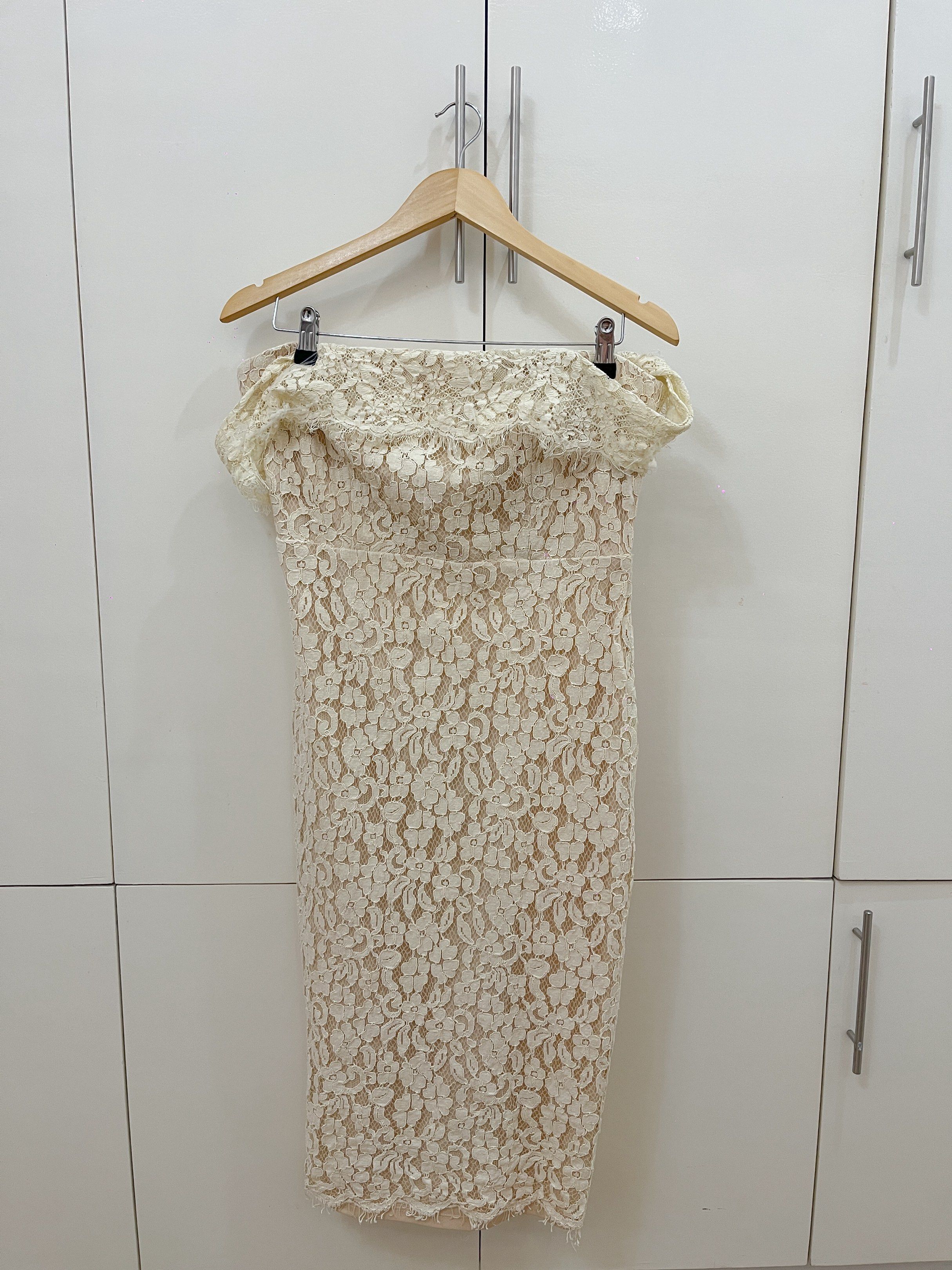 Off-Shoulder Lace Dress (Category: Dresses) located in Quezon City. Submitted by cheeseburgerry (Listing ID 1418902328, Image 1). Description: - Cream-colored off-shoulder dress - Delicate lace overlay - Fitted silhouette - Knee-length - Lined - Ideal for special events and nights out.