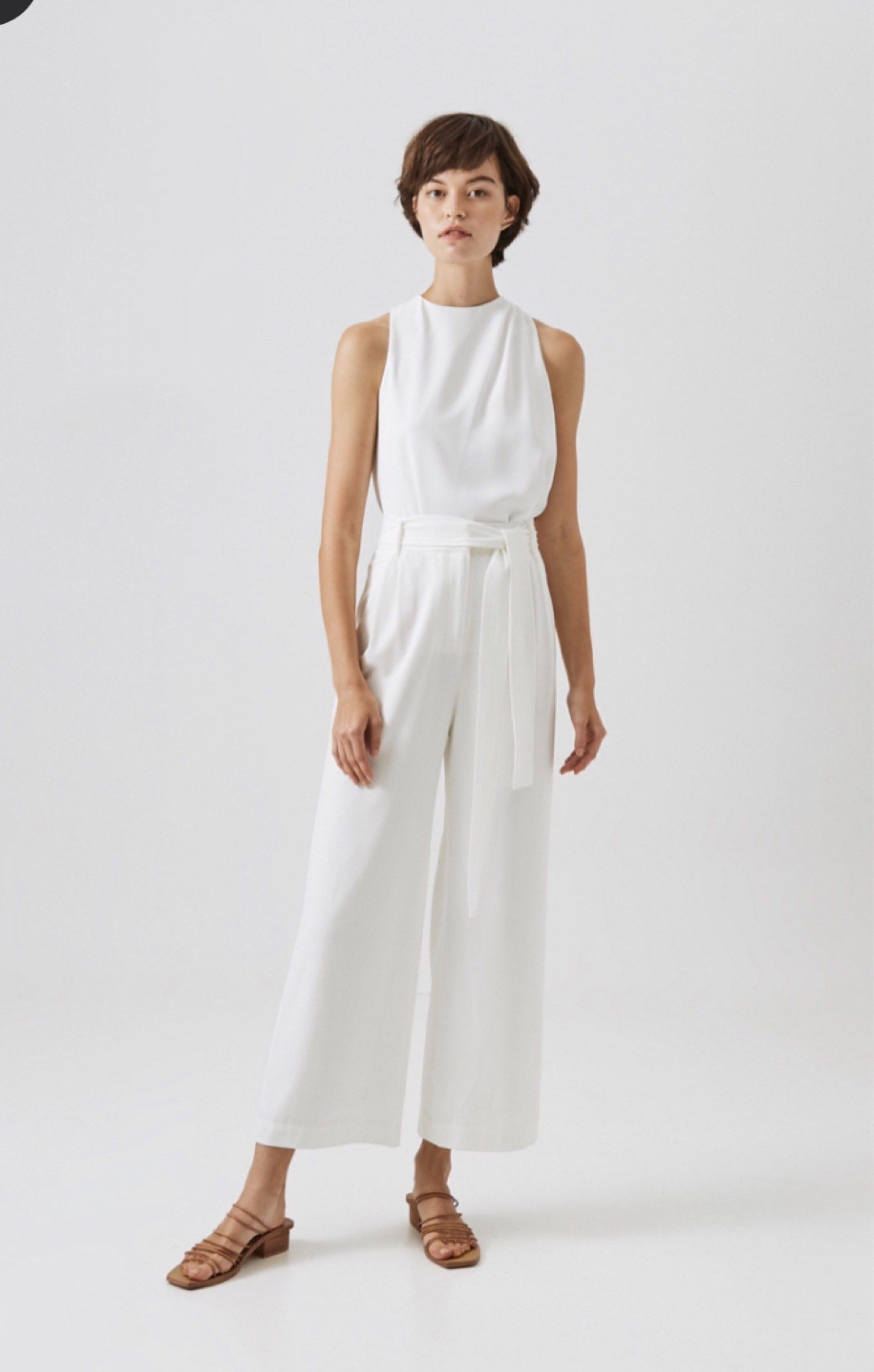 Our Second Nature Cream Wide Leg Pants (Category: Other Bottoms) located in Manila. Submitted by jcmph (Listing ID 1418830012, Image 1). Description: Cream-colored wide-leg pants from Our Second Nature. Features a matching belt and a tag that indicates the size is S. Made of 100% cotton. The pants have a classic design with a clean, minimalist aesthetic. Perfect for creating a chic and versatile outfit. First photo from Our Second Nature website.