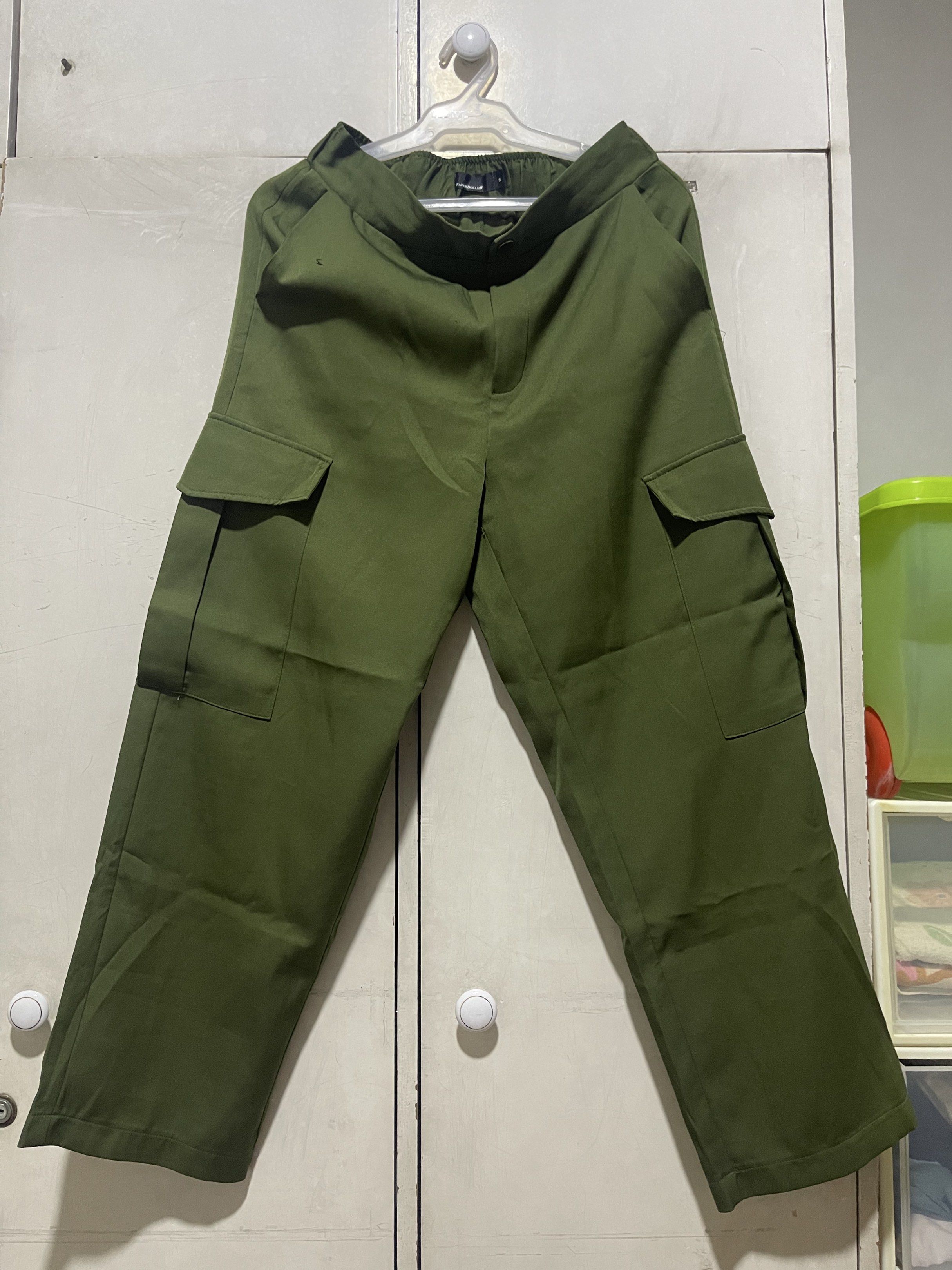 Paper Dolls Cargo Pants - Olive Green - Size S (Category: Other Bottoms) located in Quezon City. Submitted by lespyjamas (Listing ID 1418956535, Image 1). Description: - Paper Dolls cargo pants - Color: Olive green - Size: S - Relaxed fit - Two large side pockets - Smooth, woven fabric - Classic cargo style - Straight leg.
