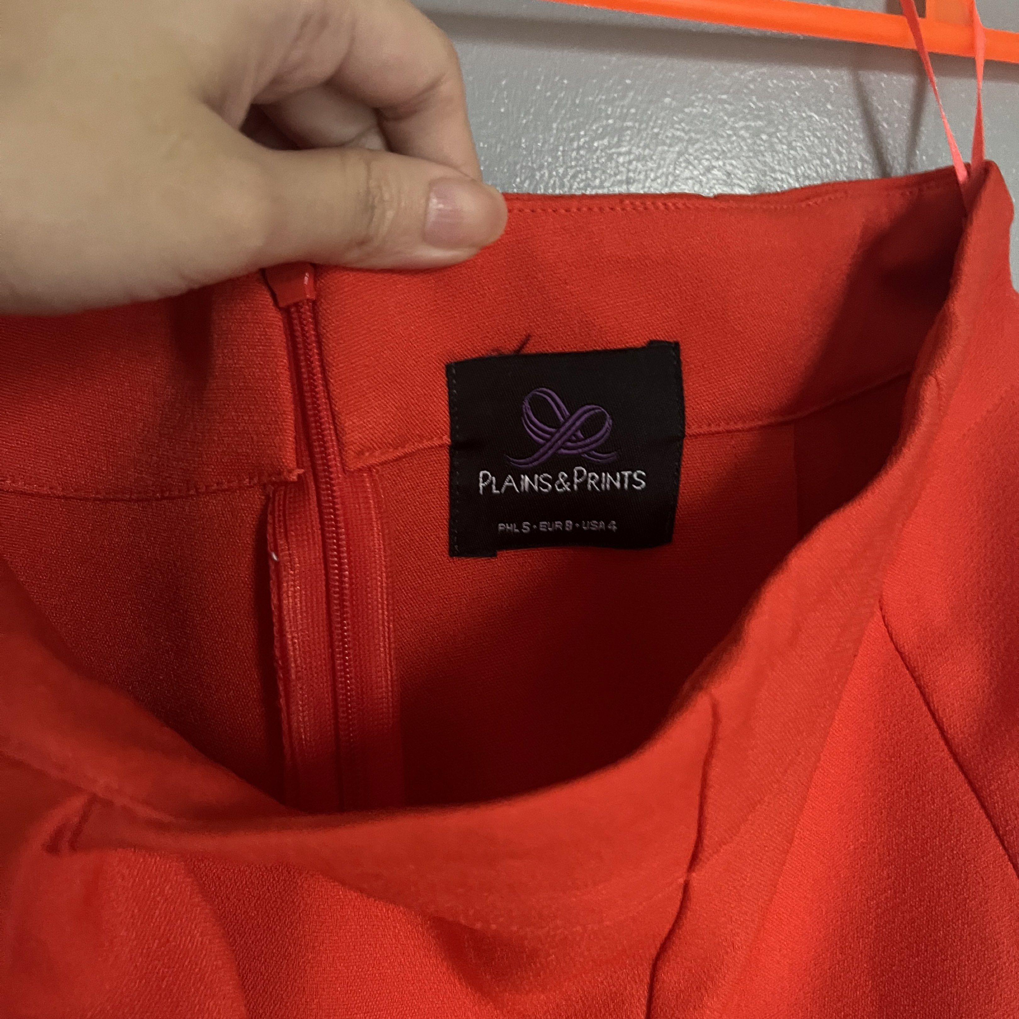 Plains & Prints Red Culottes (Category: Other Bottoms) located in Taguig. Submitted by _handydandy (Listing ID 1418906344, Image 2). Description: - Plains & Prints culottes - Vibrant red color - Size 4 - size 26-27 - High-waisted - Zipper closure sa side - perfect for smart casual - Ruffle design - Versatile style.