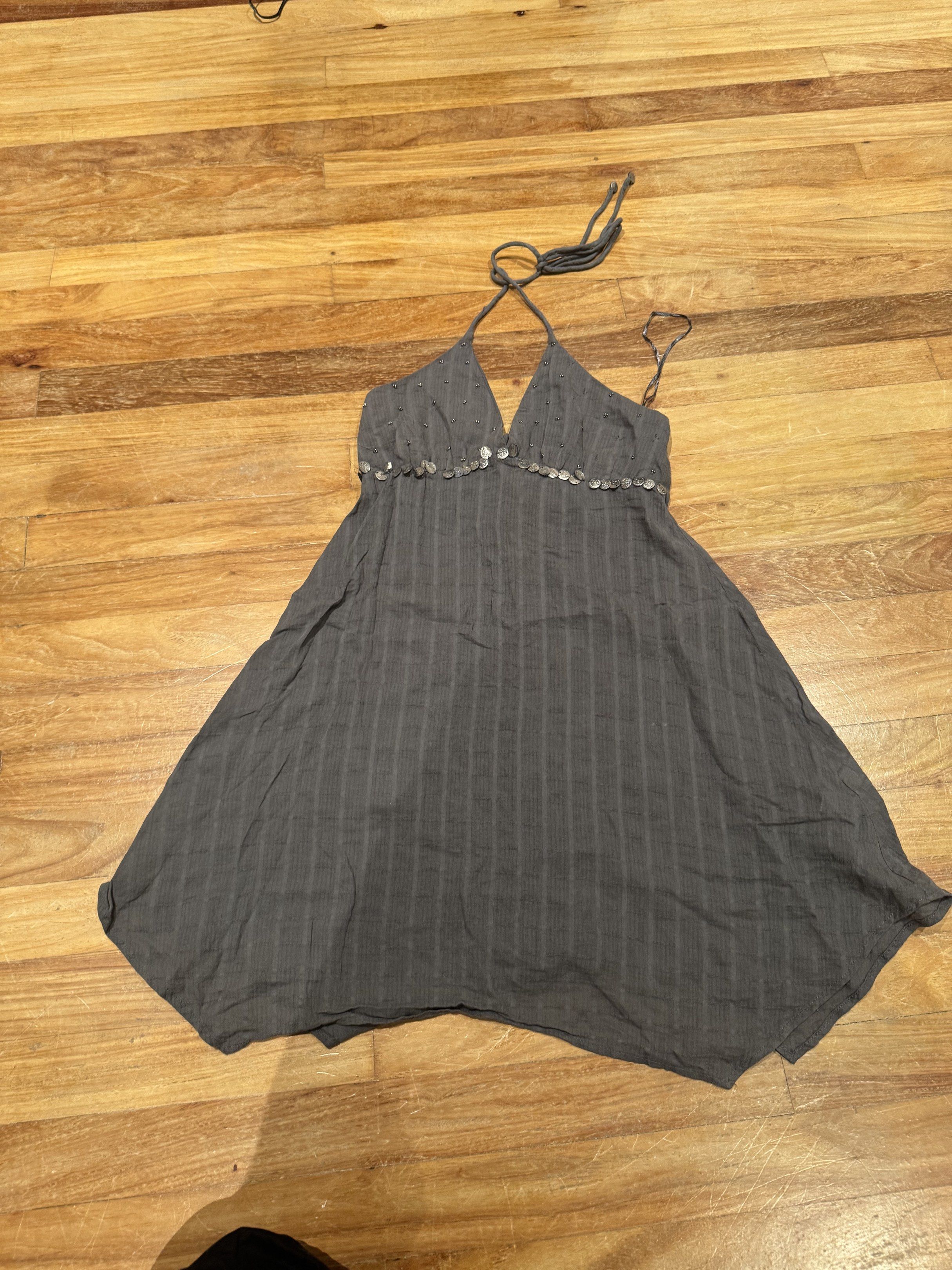 Halter Dress BOHO COACHELLA vibe (Category: Dresses) located in Makati City. Submitted by maxisawesome (Listing ID 1418911111, Image 1). Description: - Pull&Bear dress - Halter neck design - Size: S - Color: Gray - Embellished neckline - Flattering silhouette - Lace-up back detail - Perfect for various occasions.