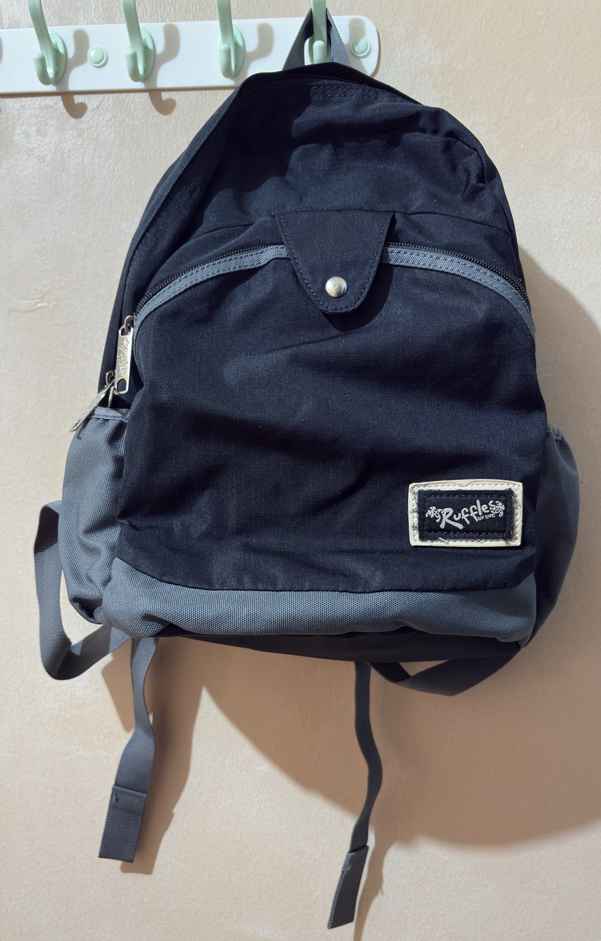 Ruffles Bag Patrice Backpack - Black (Category: Backpacks) located in Manila. Submitted by margascloset_ (Listing ID 1418780978, Image 2). Description: Black Lightly used Rfs: not using anymore Bought it in SM dept for P999 Has ballpen marks on photos #5 & #6 Measurements: - H: 13 in - W: 12.5 in Laptop/Tablet pocket: - H: 8 in - W: 9 in MOP: Gcash, BPI, PNB.
