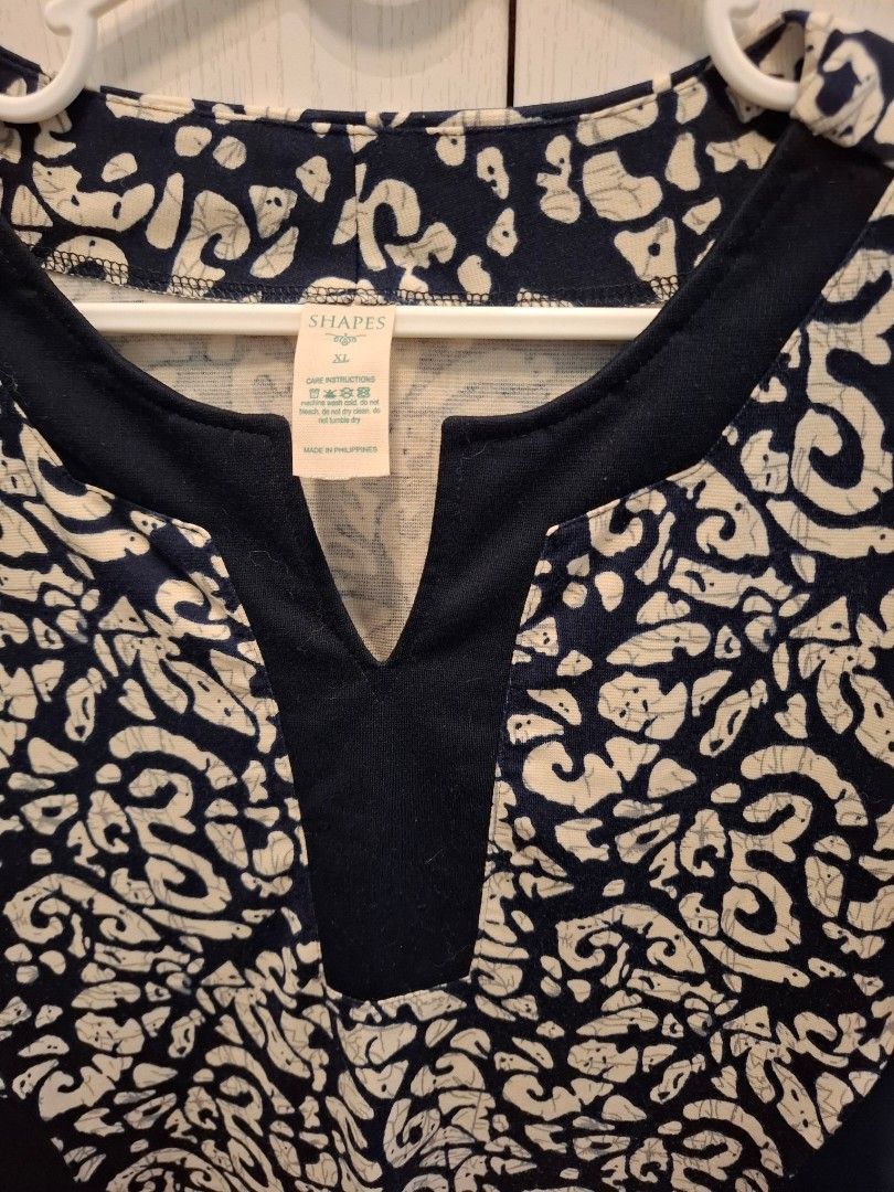 Shapes XL Printed Dress (Category: Dresses) located in Makati City. Submitted by chyna527 (Listing ID 1418889765, Image 3). Description: - Navy blue and cream print - V-neck design - Short sleeves - Size: XL - Made in the Philippines - Comfortable fabric - Perfect for casual wear.