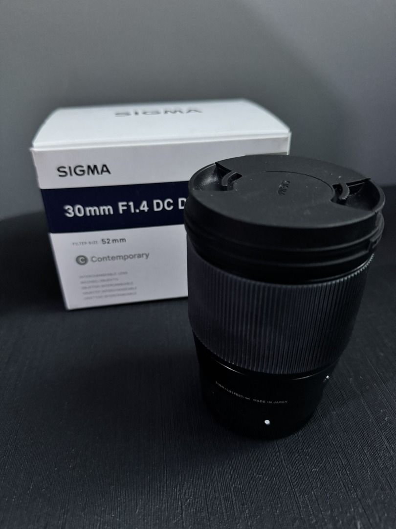 Sigma 30mm F1.4 Camera Lens (Category: Lens & Kits) located in Caloocan City. Submitted by jmicael (Listing ID 1418867944, Image 1). Description: 1 piece available. Bought around Q2 2020. Used with a Sony A6400 for webcam purposes. Comes with box. 📍 Open for inspection at The Grove by Rockwell (we can agree on a date and time 😄). Full list of items for sale here: https://rpsycael.notion.site/ucastgaragesale.
