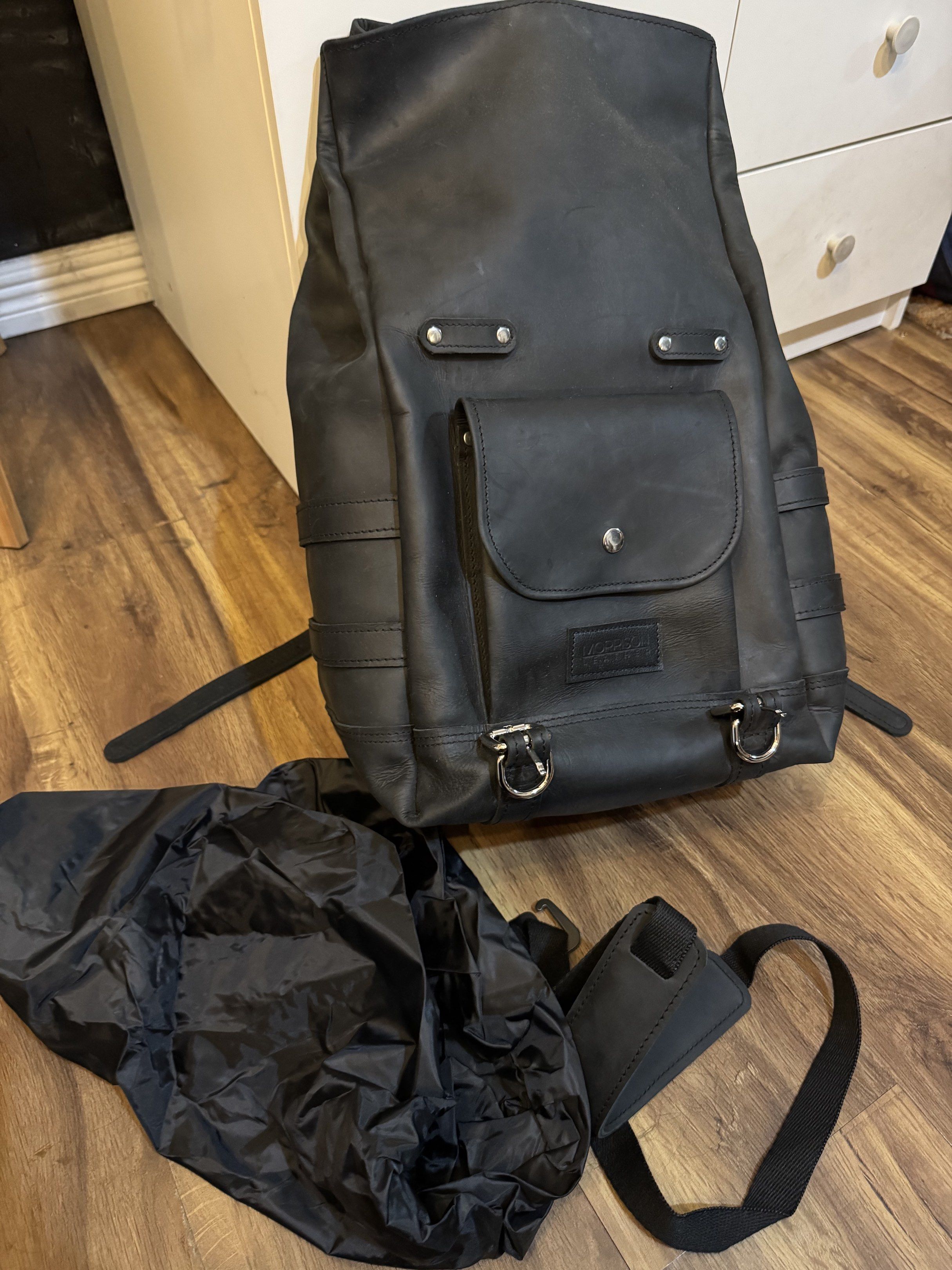 Sissy bar bag + Back pack Genuine Cowhide Leather for Classic Bike Harley Davidson (Category: Other Motorcycles Parts and Accessories) located in Manila. Submitted by leonardo.declutter (Listing ID 1418931294, Image 2). Description: - Morrison Leather black leather backpack - Front pocket with snap closure - Silver buckles - Adjustable straps - Includes rain cover - Laptop compartment - Durable and stylish design.