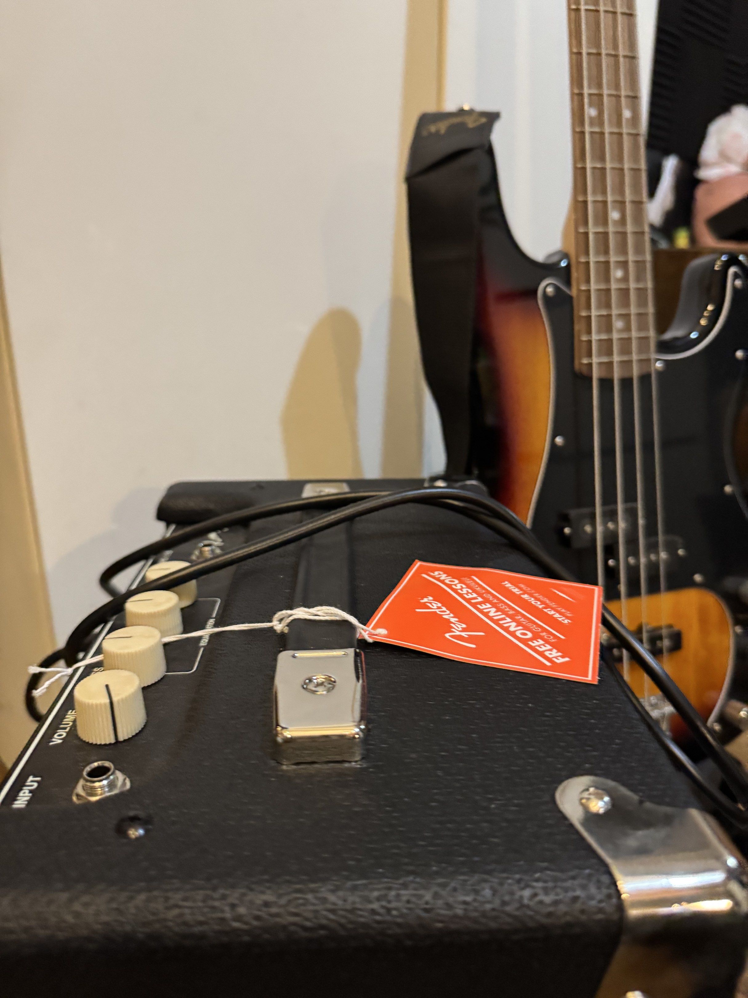 Squier Precision Bass Guitar with Fender Amplifier (Category: Musical Instruments) located in Manila. Submitted by leonardo.declutter (Listing ID 1418930112, Image 3). Description: - Squier Precision Bass guitar - Almost BRAND NEW - Sunburst finish - Black pickguard - Fender amplifier - Includes cable - With "FREE ONLINE LESSONS" tag - With Bass Bag - With plastics and tags RFS: Extra Unit No box.