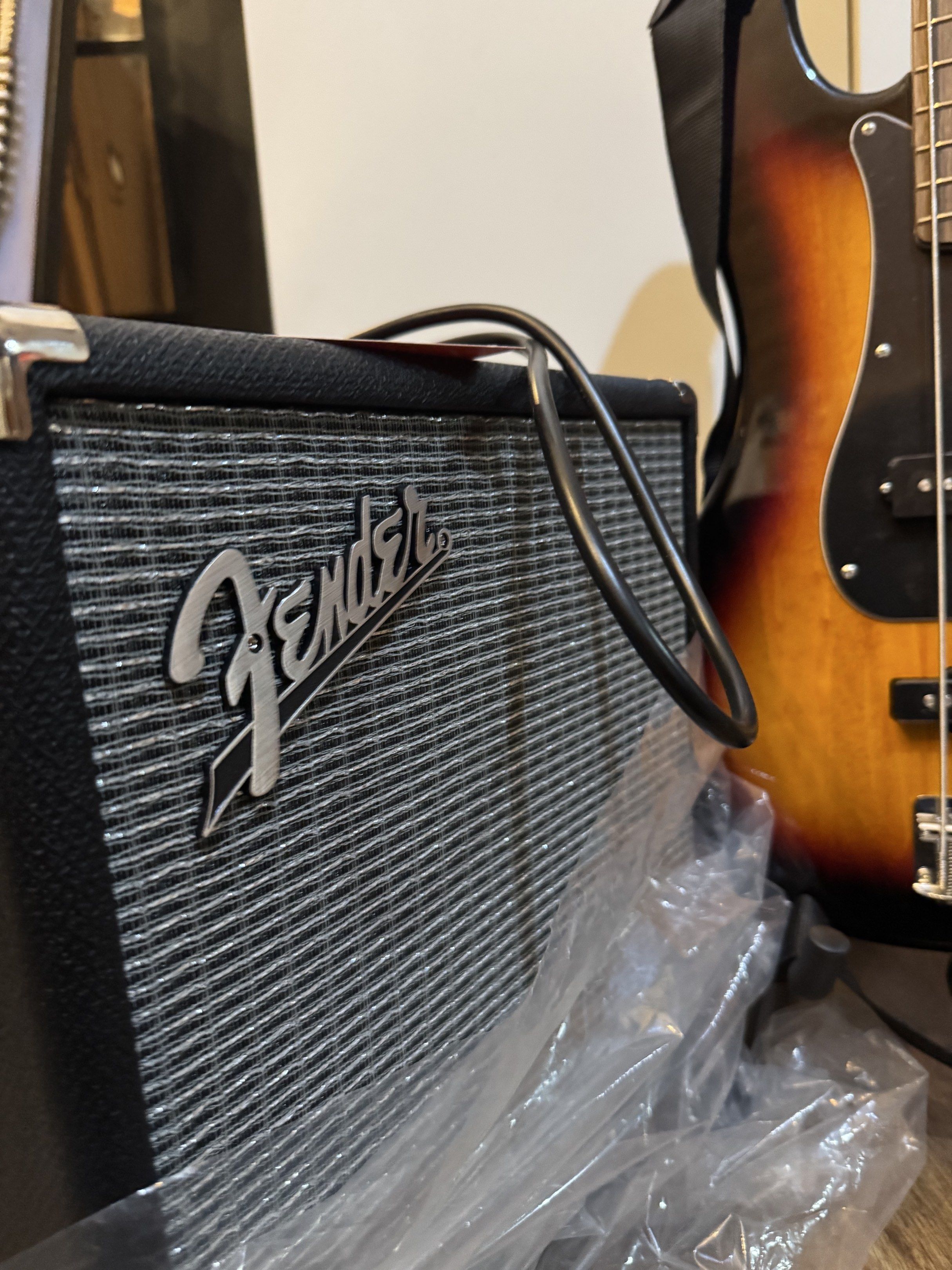 Squier Precision Bass Guitar with Fender Amplifier (Category: Musical Instruments) located in Manila. Submitted by leonardo.declutter (Listing ID 1418930112, Image 1). Description: - Squier Precision Bass guitar - Almost BRAND NEW - Sunburst finish - Black pickguard - Fender amplifier - Includes cable - With "FREE ONLINE LESSONS" tag - With Bass Bag - With plastics and tags RFS: Extra Unit No box.