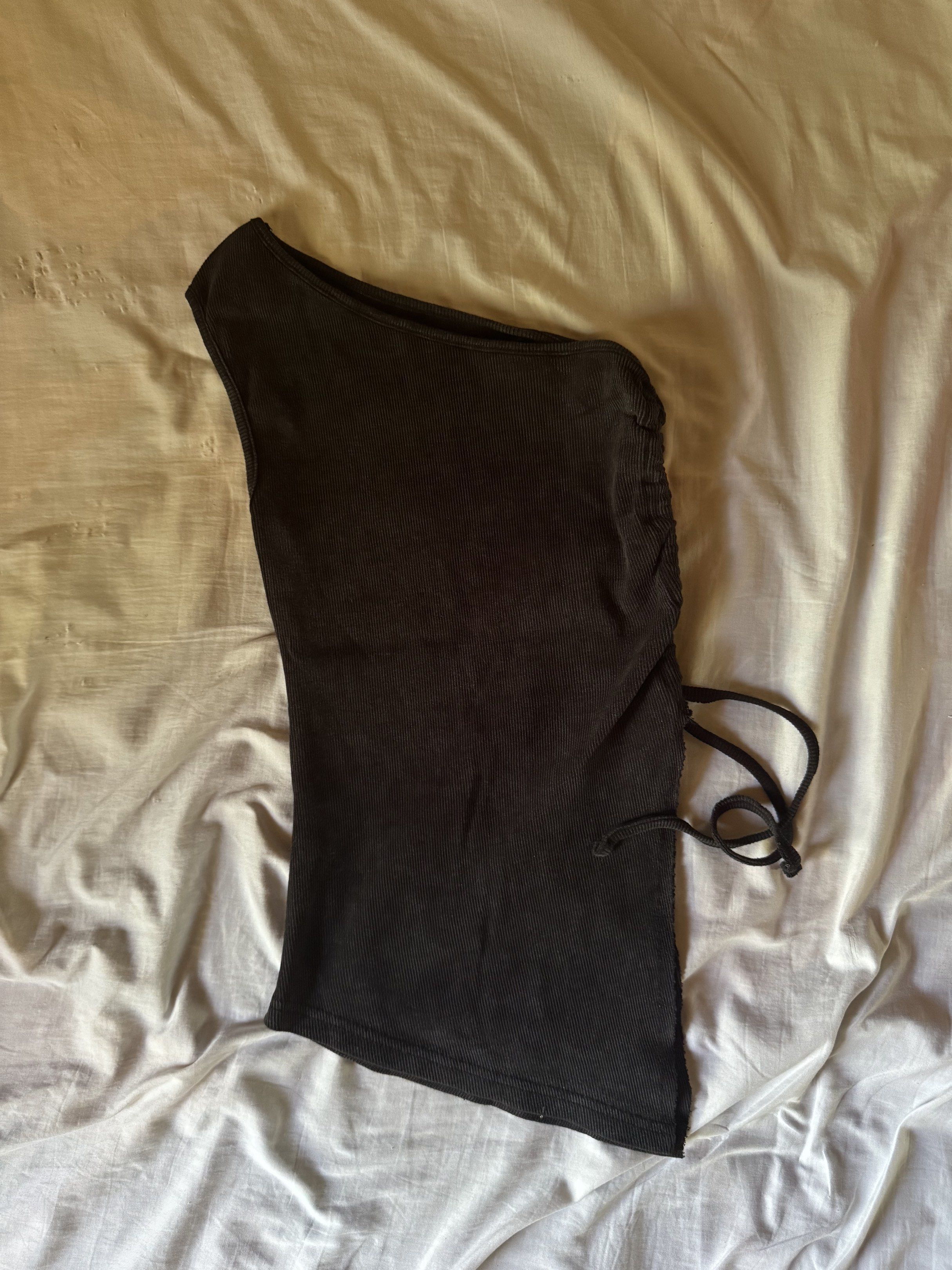 Trendyol Asymmetrical Knitted Top (Category: Sleeveless) located in Glan. Submitted by softgasps (Listing ID 1418786084, Image 3). Description: - Used only once. Like new - Pristine, no flaws - size xs - Bought on zalora - Ships from mindanao.