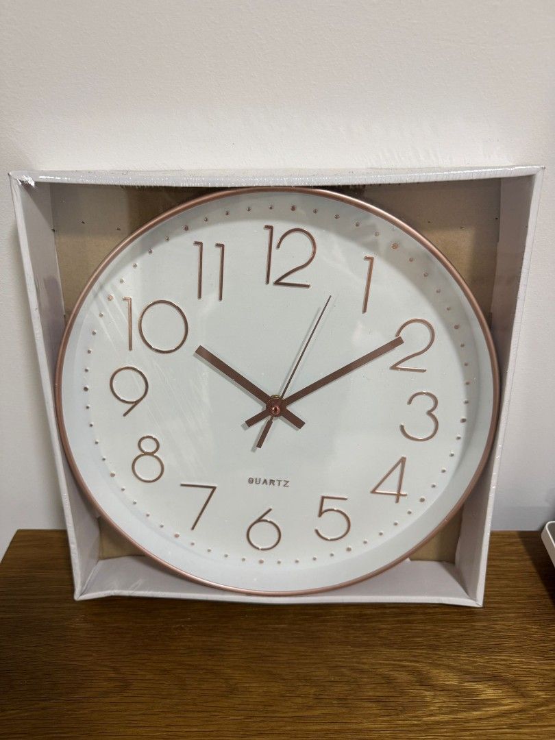 Wall Clock (Category: Clocks) located in Singapore. Submitted by simplygo_store (Listing ID 1418854656, Image 1). Description: Brand New Wall Clock 30cm in Rose Gold Unopened and unused.