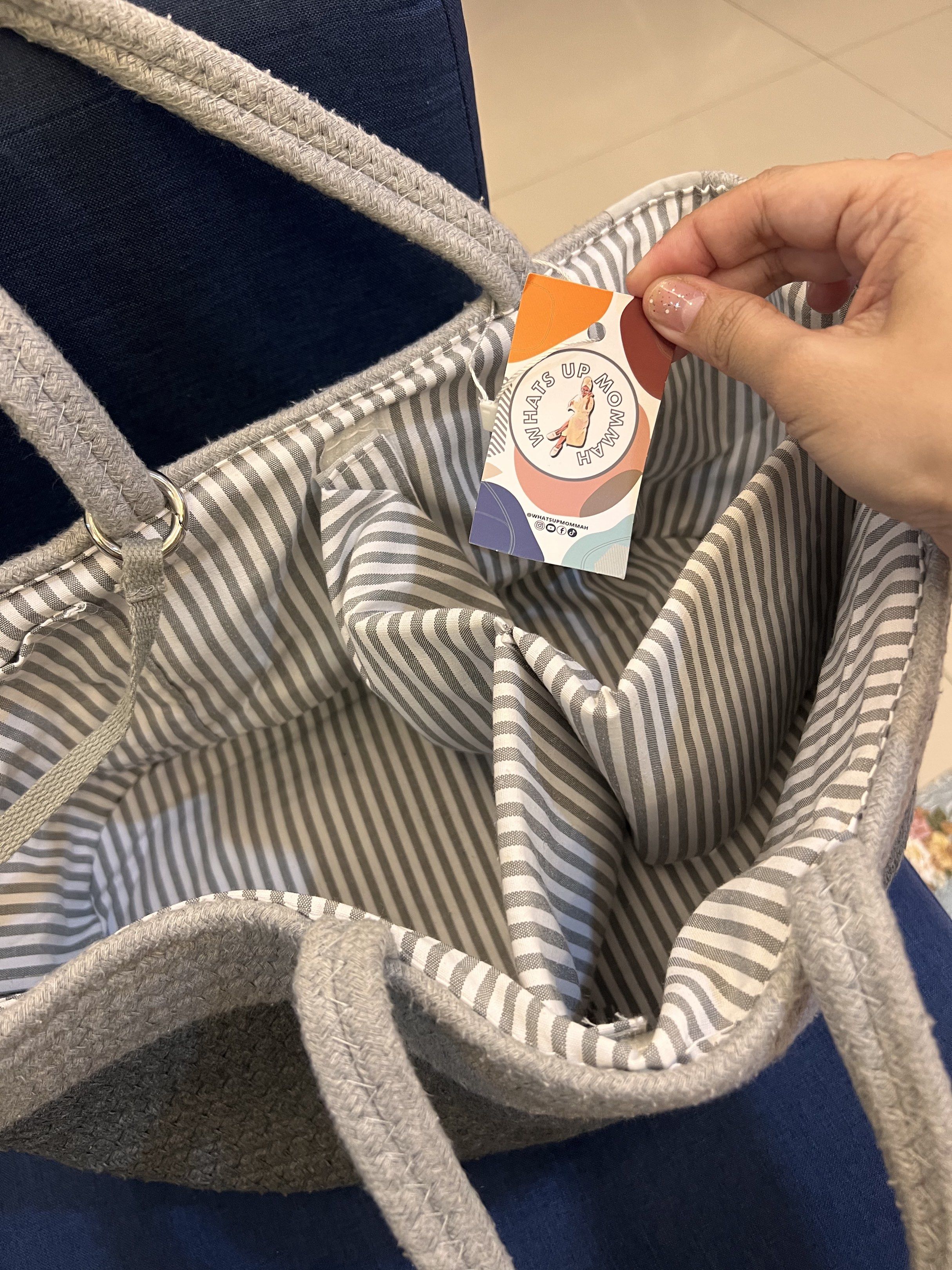 WhatsUpMommah Moonstone Caddy Bag (Category: Diaper Bags & Wetbags) located in Quezon City. Submitted by haneypd (Listing ID 1418895242, Image 3). Description: - WhatsUpMommah Moonstone Caddy Bag - Stylish gray rope exterior - Chic striped interior - Convenient handles for easy carrying - Multiple compartments for organized storage - Includes brand tag.