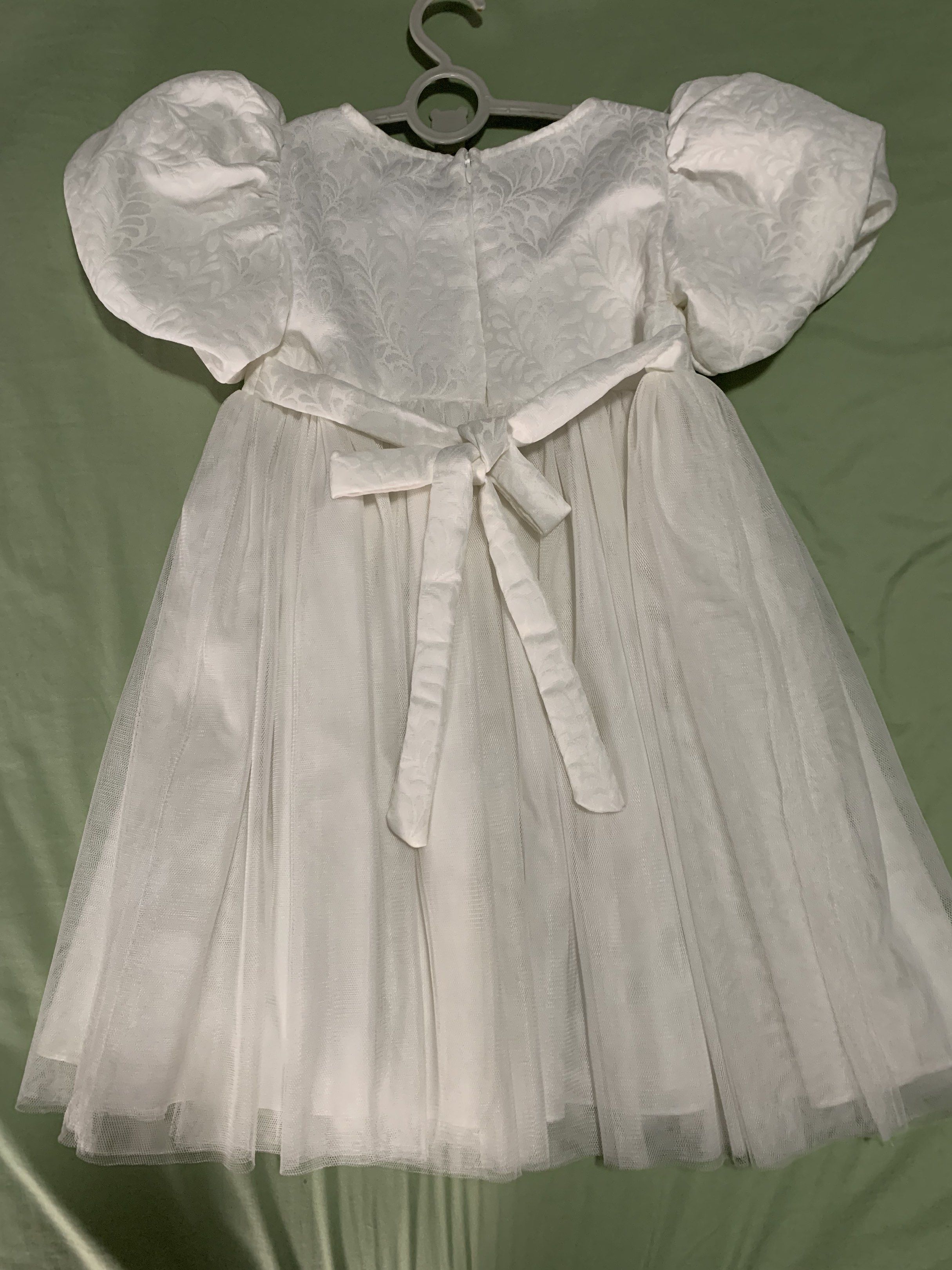 White Dress with Puff Sleeves - used once (Category: Babies & Kids Fashion) located in Pasig City. Submitted by dc_declutters (Listing ID 1418819085, Image 2). Description: Perfect for graduation of preschooler RFS: Outgrown Used once only when my 3yo graduated from her playschool Can fit 2 to 4 year old kid Length: 24 inches Shoulders: 10 inches.