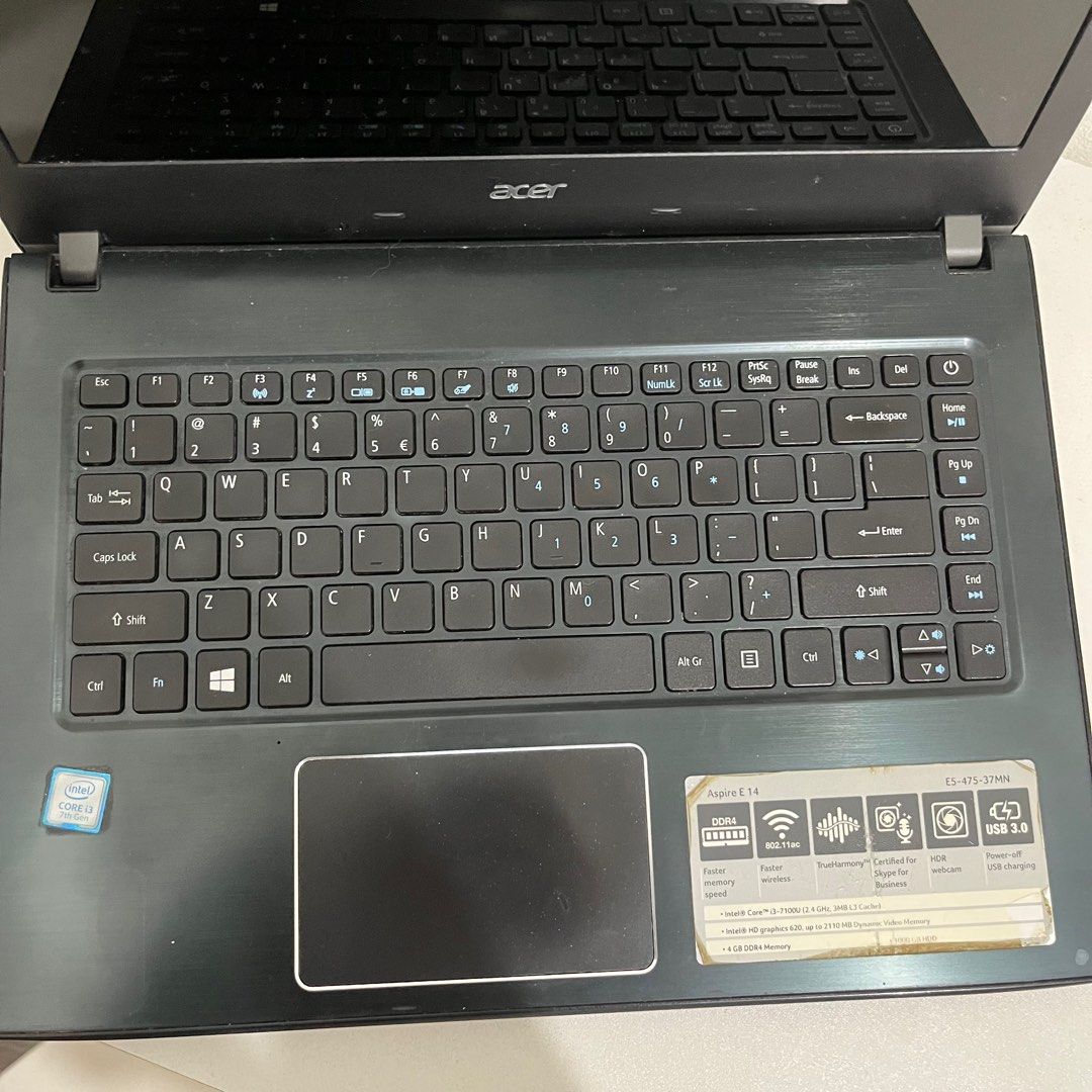 Acer Aspire E14 Laptop (Pasig City) (Category: Laptops & Notebooks) located in Pasig City. Submitted by tiffanieann (Listing ID 1413458758, Image 2). Description: - Acer Aspire E14 laptop - Intel Core i3 processor - Black keyboard and trackpad - Acer logo on top - Model: ES-475-32MN - Includes webcam cover - Manufactured in 2017 Specs: Display: 14-inch HD (1366x768) Acer CineCrystal LED-backlit TFT LCD. Processor: Intel Celeron, Pentium, Core i3,